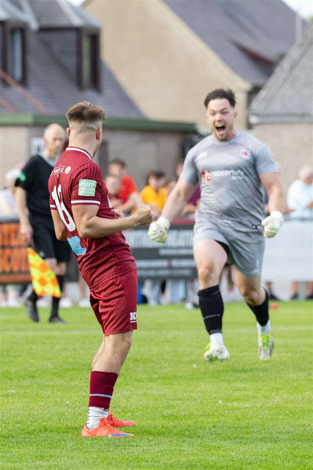 Keith's Craig Reid celebrates with Liam Duncan as scores the decider to take his team through to the semi-final. ..Keith F.C. v Buckie Thistle F.C. at Kynoch Park, Highland League Cup Quarter-Final. ..Picture: Beth Taylor.