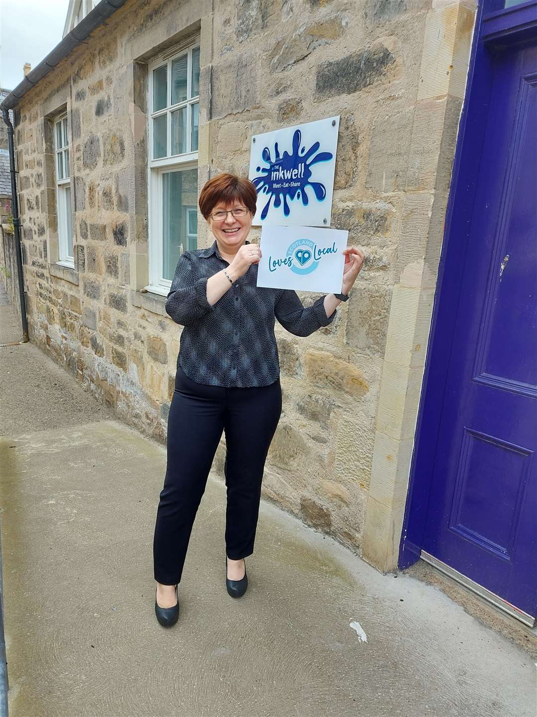 Embrace Elgin Chief Executive Gill Neill showing her support for the Scotland Loves Local campaign