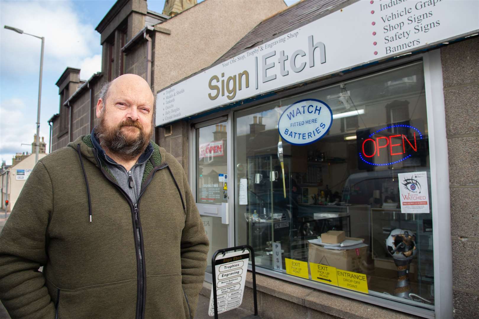 Glad to be back: Steve Thornton, owner of Sign Etch in Buckie. Picture: Daniel Forsyth