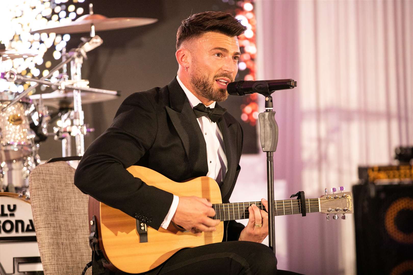 Jake Quickenden, who first became well known performing on The X Factor, sang at Sarcoma UK’s Glitter Ball in March 2023 (Ian Randall/Sarcoma UK/PA)