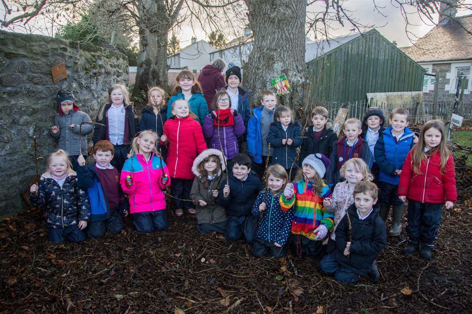 St Thomas RC primary pupils in the waste ground patch next to the Keith school, which they will transform into a wild garden for outdoor learning. Picture: Becky Saunderson.