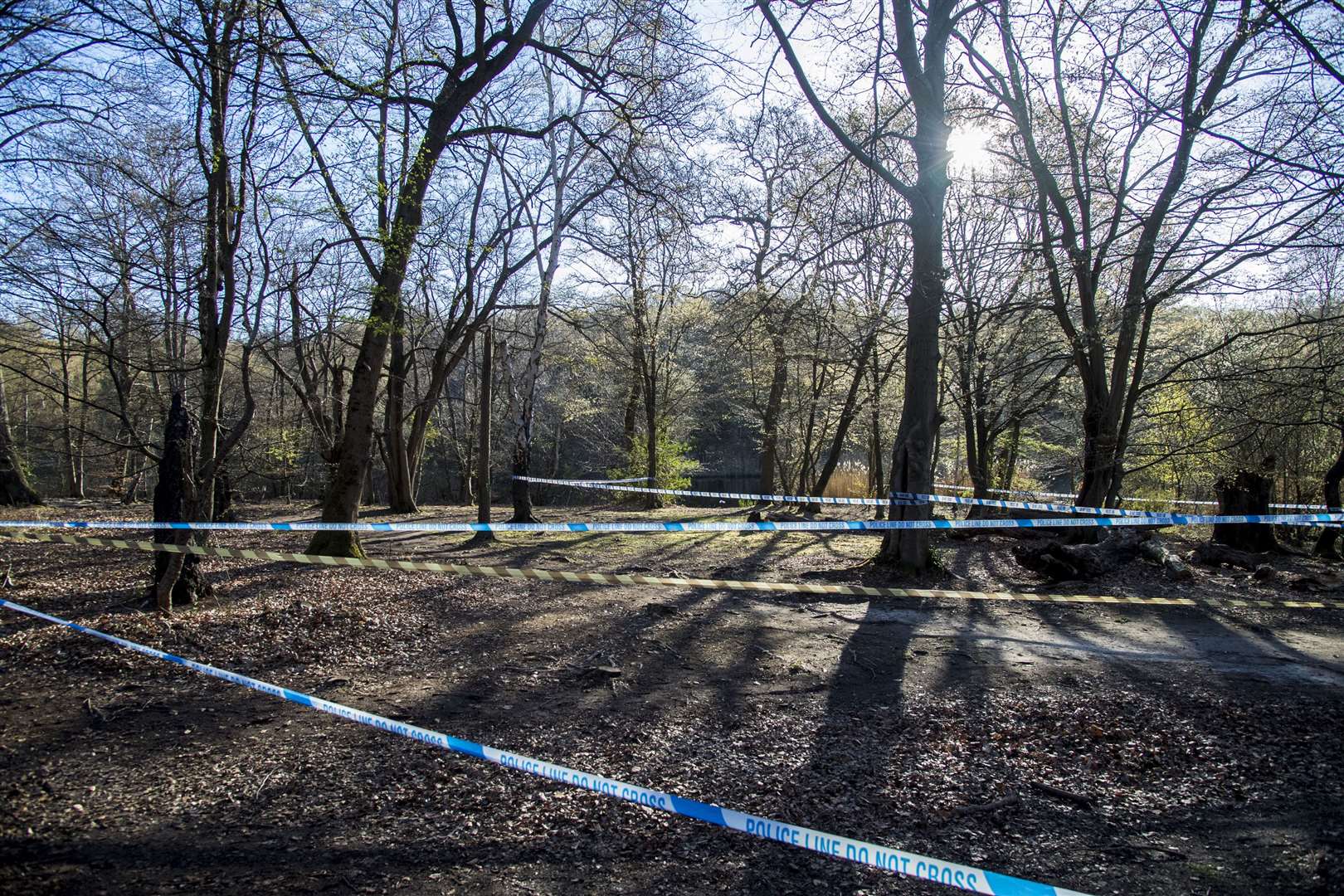 Police tape around Wake Valley pond in Epping Forest (Ian West/PA)