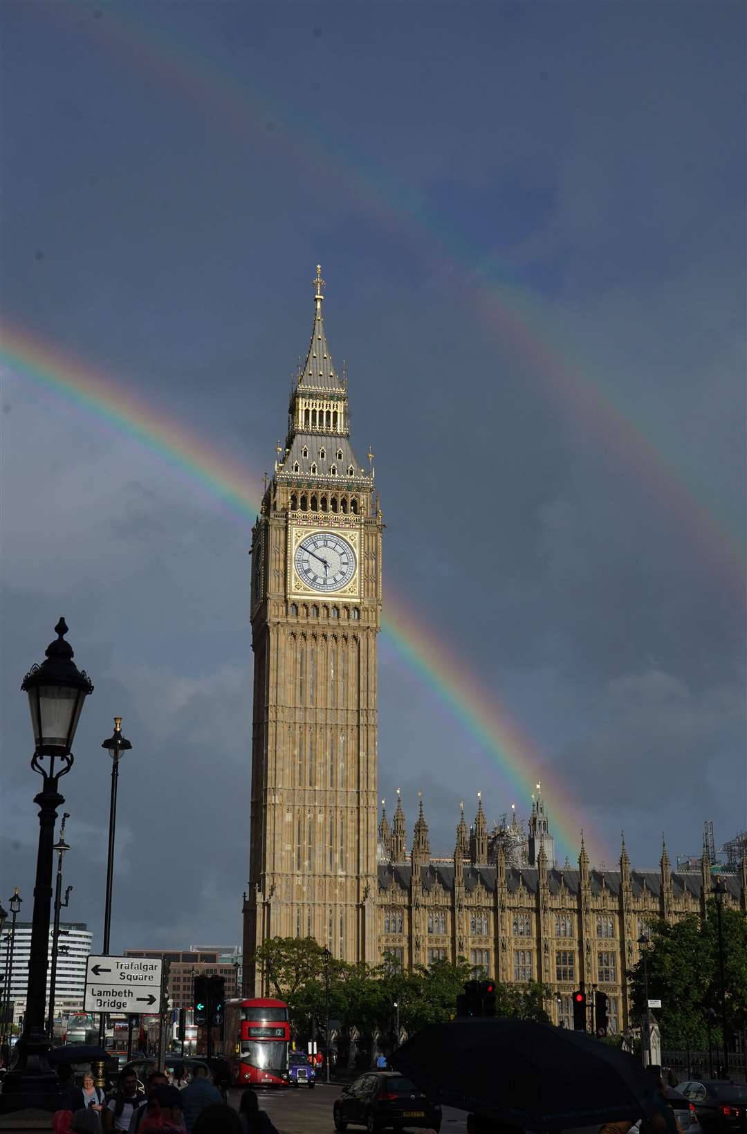 A double rainbow is seen over Elizabeth Tower in Westminster, London, following a rain shower (Ian West/PA)