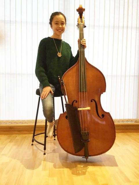 Cara Dick with her new stool for the double bass.