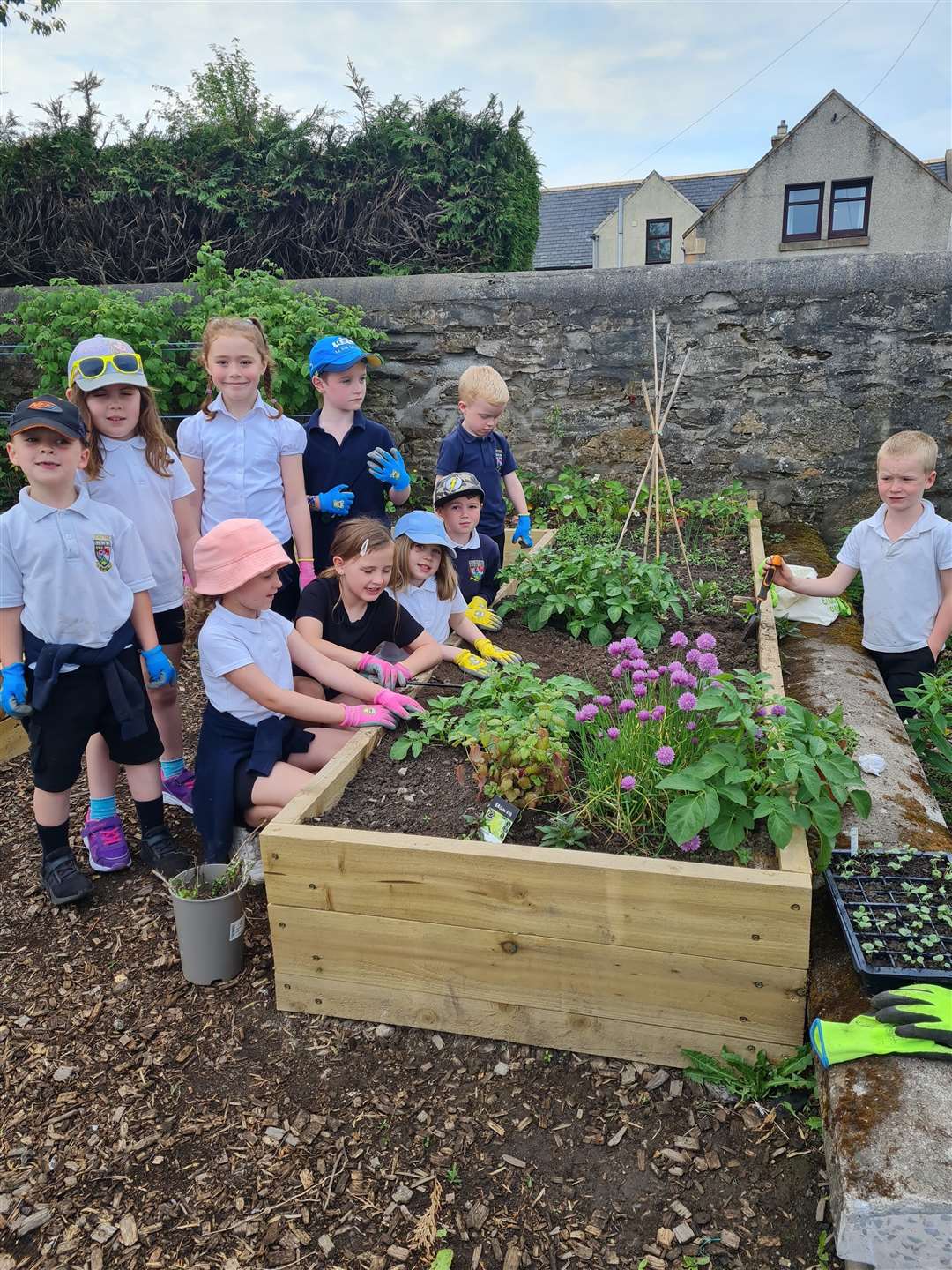 Pupils enjoying the new garden at Keith Primary School.