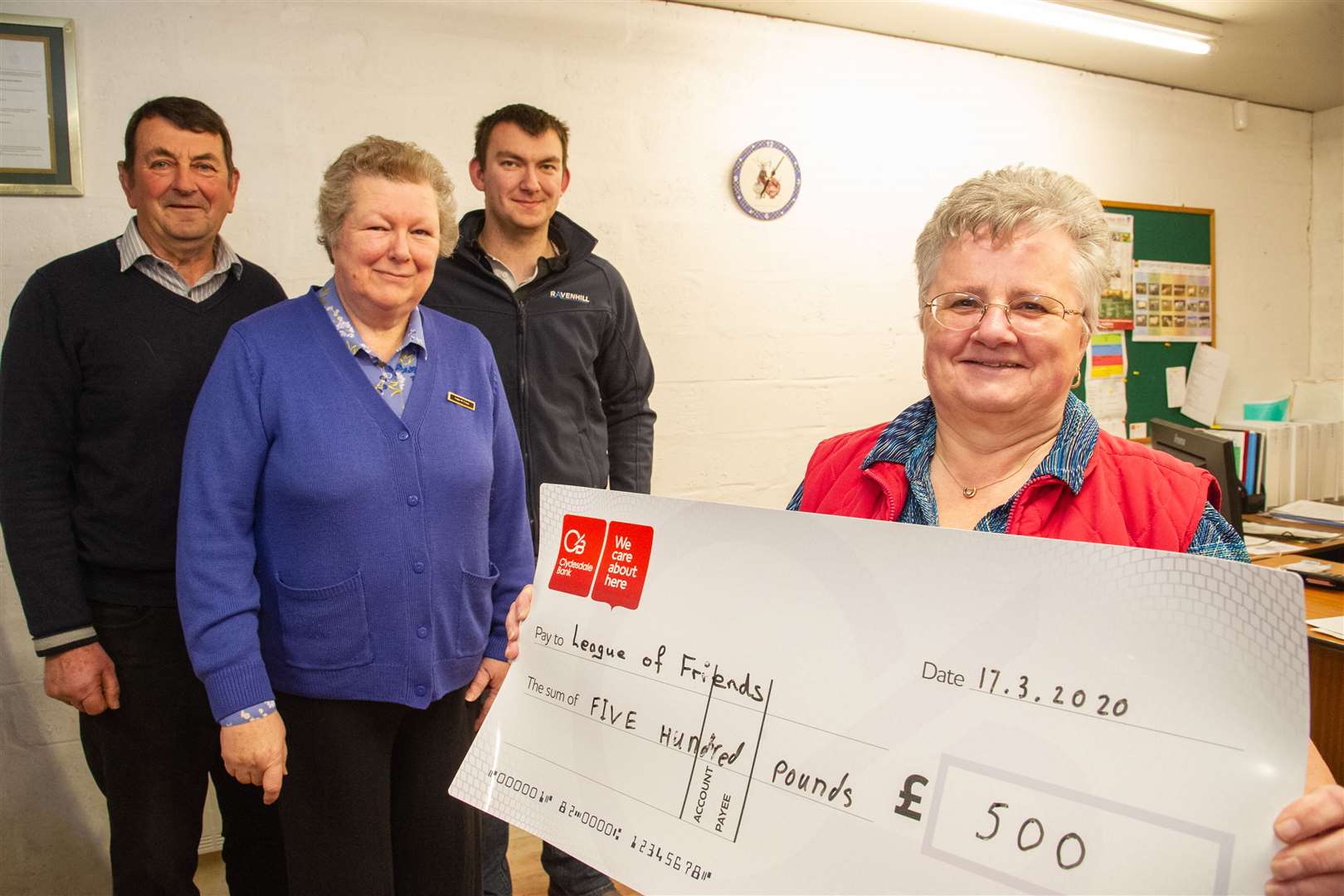 The Keith Show presents a cheque for £500 to the League of Friends after a successful tractor run last May. LtR: Ewan Stewart (Keith Show vice chairman), Margaret Lloyd (League of Friends chairwoman), Aidan Stewart (Keith Show vintage convener) and Margaret Allan (League of Friends commitee member). Picture: Daniel Forsyth