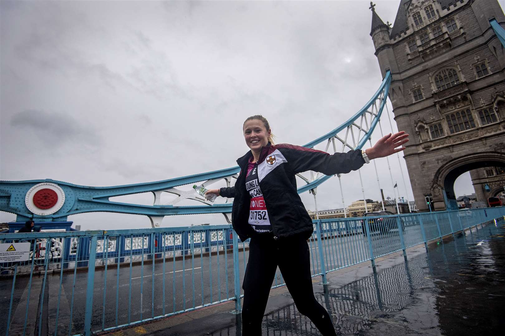 This runner took in one of the more familiar sights of the usual marathon route, heading over Tower Bridge (Victoria Jones/PA)