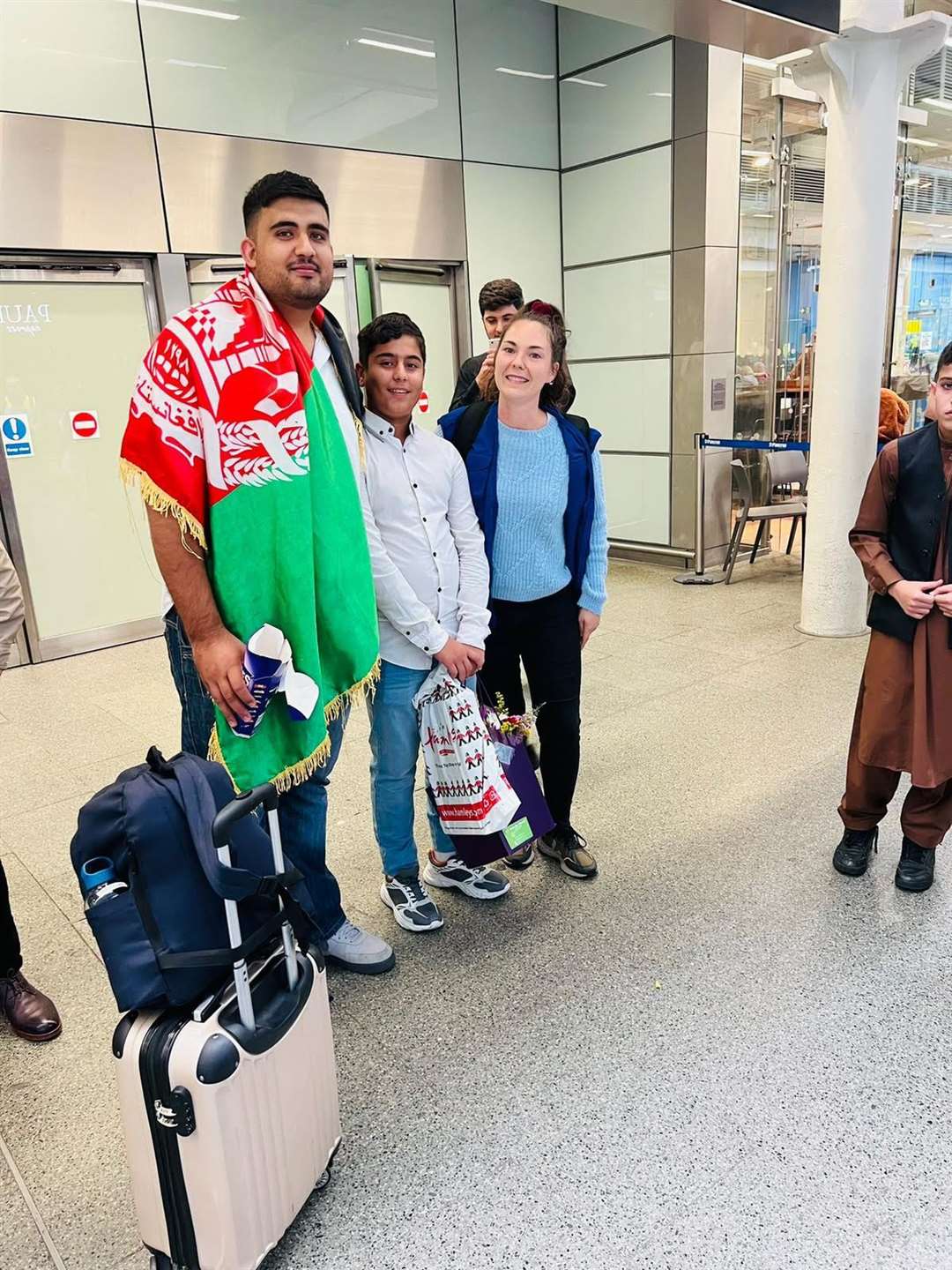 Obaidullah and his cousin Qamar, who fought to get his visa approved to look after him in the UK (PA)