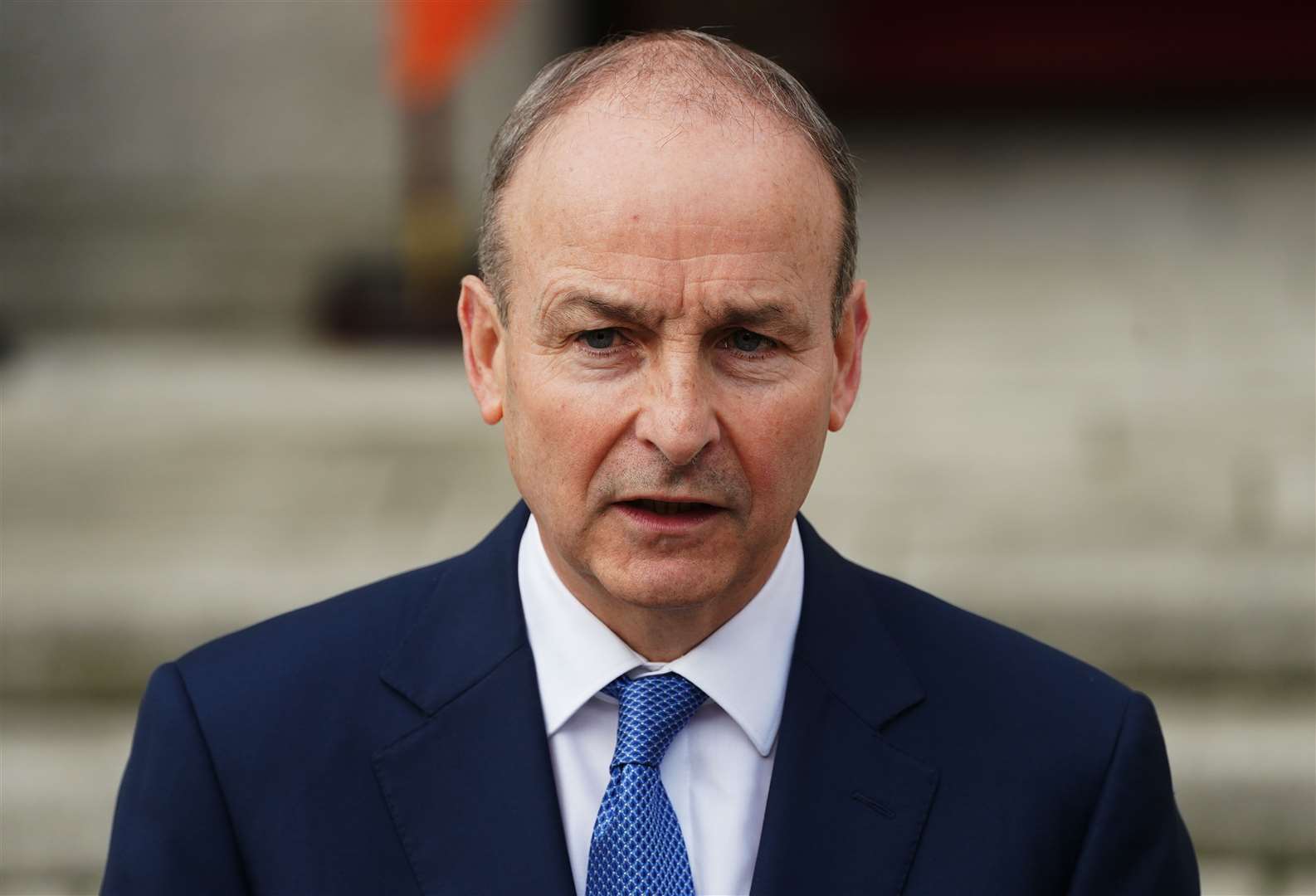Micheal Martin will resign as taoiseach on Saturday morning (PA)