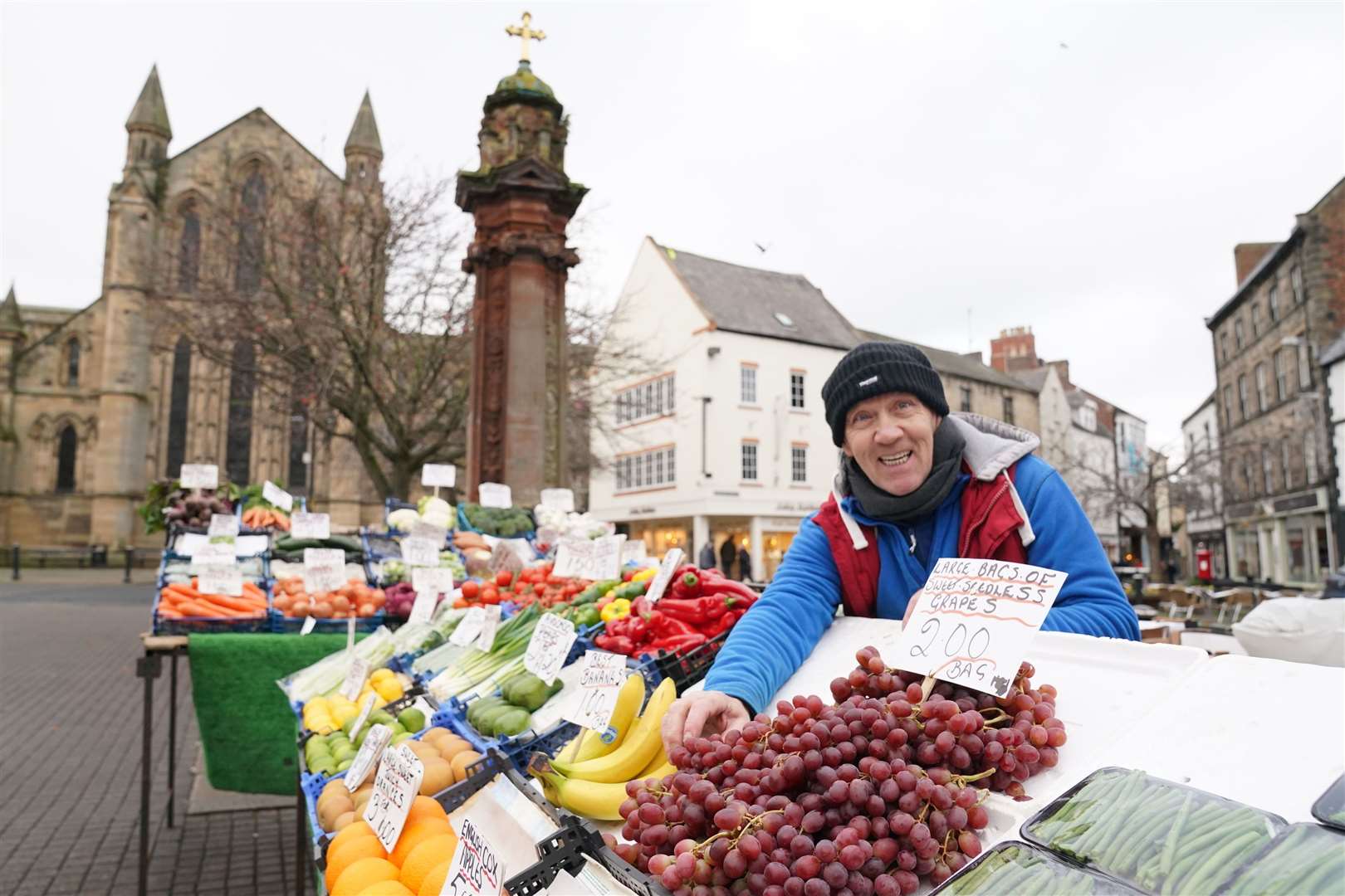 Fruit and vegetable seller Billy Atkinson, 59, outside the abbey in Hexham (Owen Humphreys/PA)