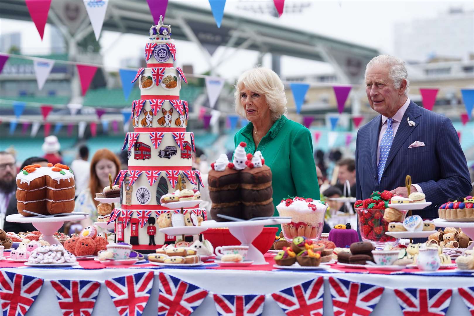 The Prince of Wales and Duchess of Cornwall attend the Big Jubilee Lunch with tables set up on the pitch at The Oval cricket ground (Stefan Rousseau/PA)