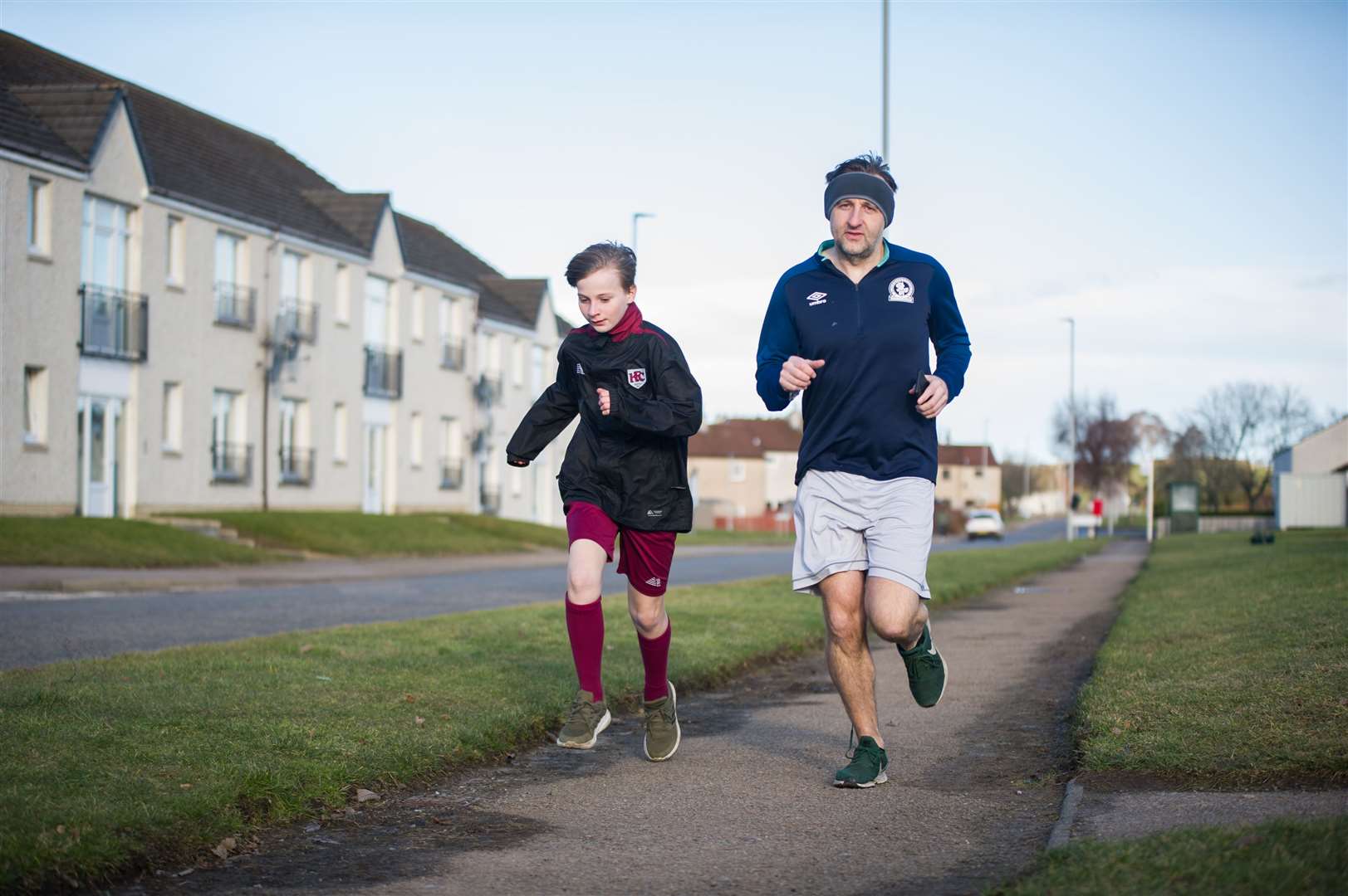 He sets off for a five-mile run with his dad Steve...Lukas Borzoni is running 50 miles to raise money for Crohns and Colitis. ..Picture: Becky Saunderson..