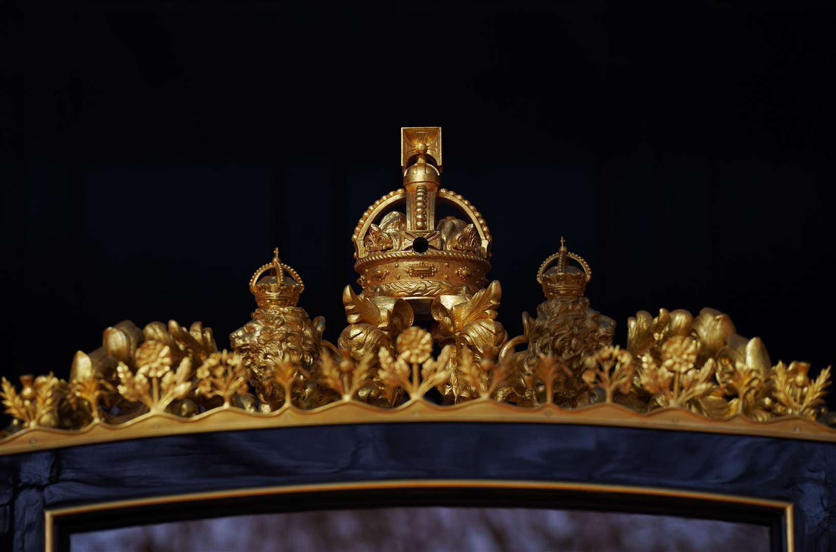 The crown on top of the Diamond Jubilee State Coach can hold a camera (Yui Mok/PA)