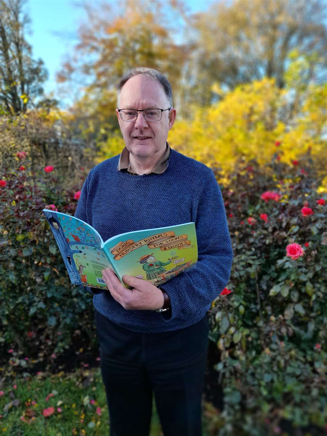 Author Gordon M Hay with his new book Doric Nursery Rhymes for Loons & Quines.