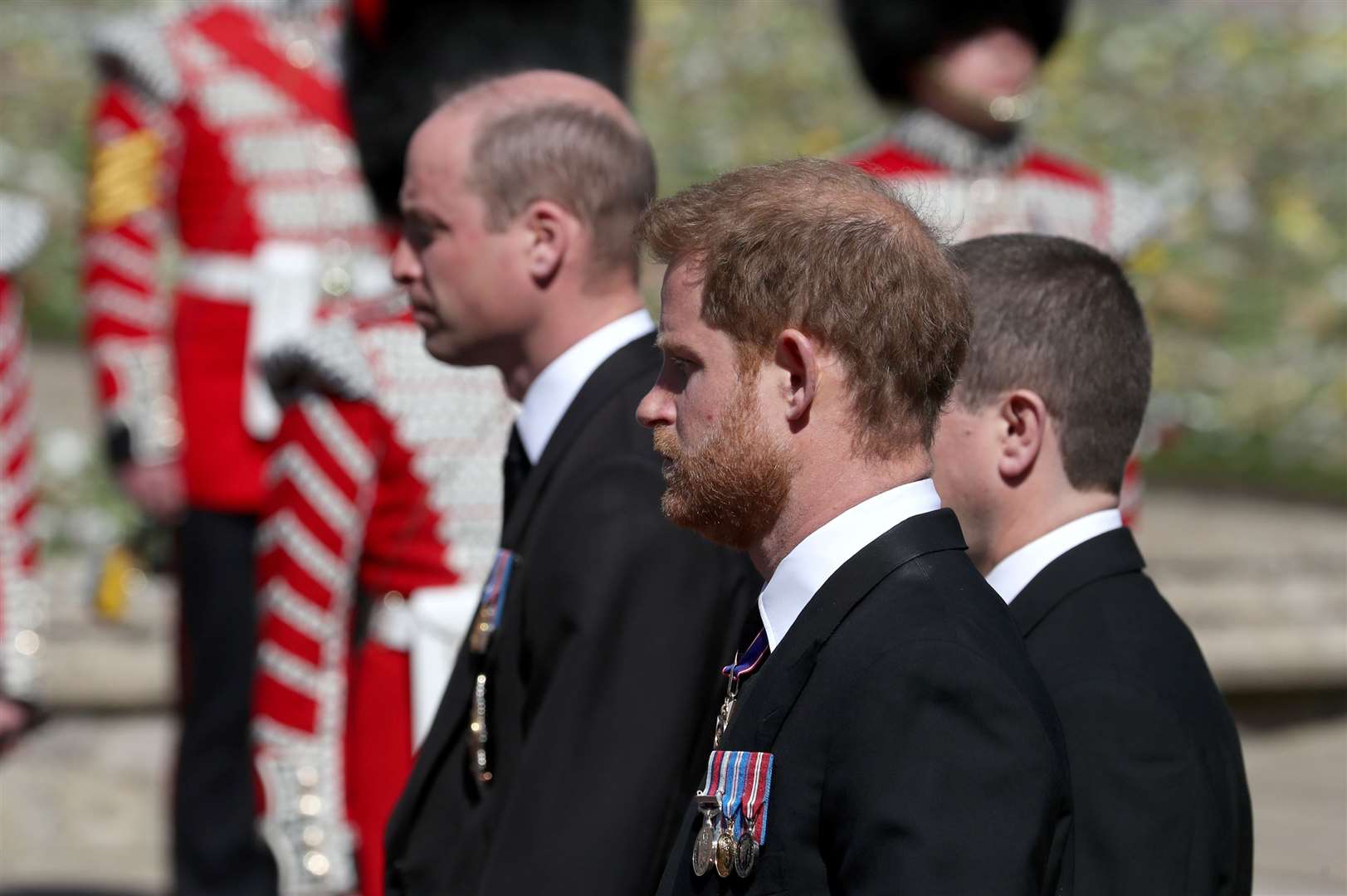 The Duke of Cambridge and the Duke of Sussex walk behind the coffin on its way to the chapel (Gareth Fuller/PA)