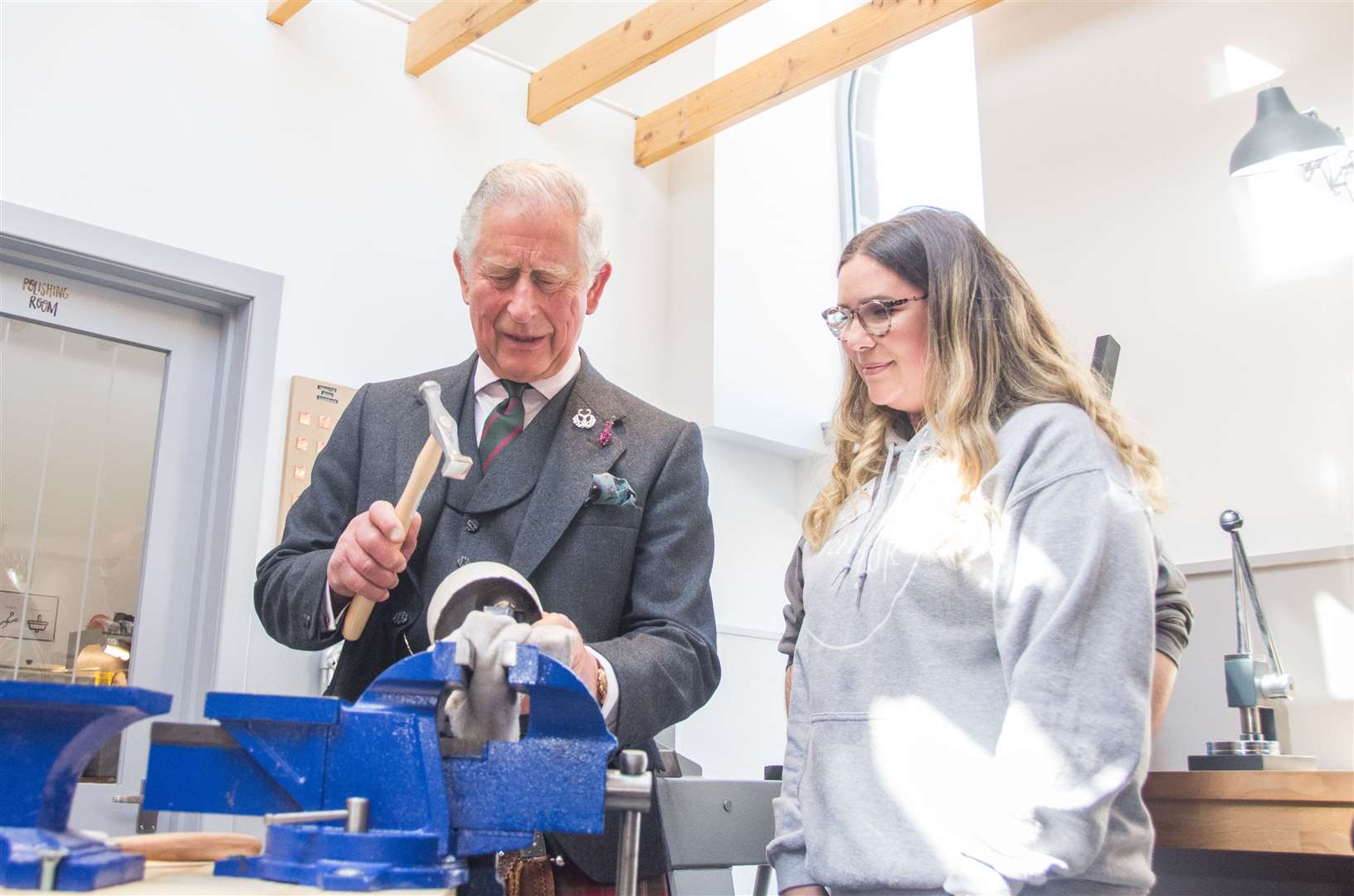 HRH Duke Of Rothesay visited The Smiddy run by Vanilla Ink in Banff and got the chance to try some crafting under the guidance of silversmith Megan Falconer. Picture: Becky Saunderson. Image No.043838.
