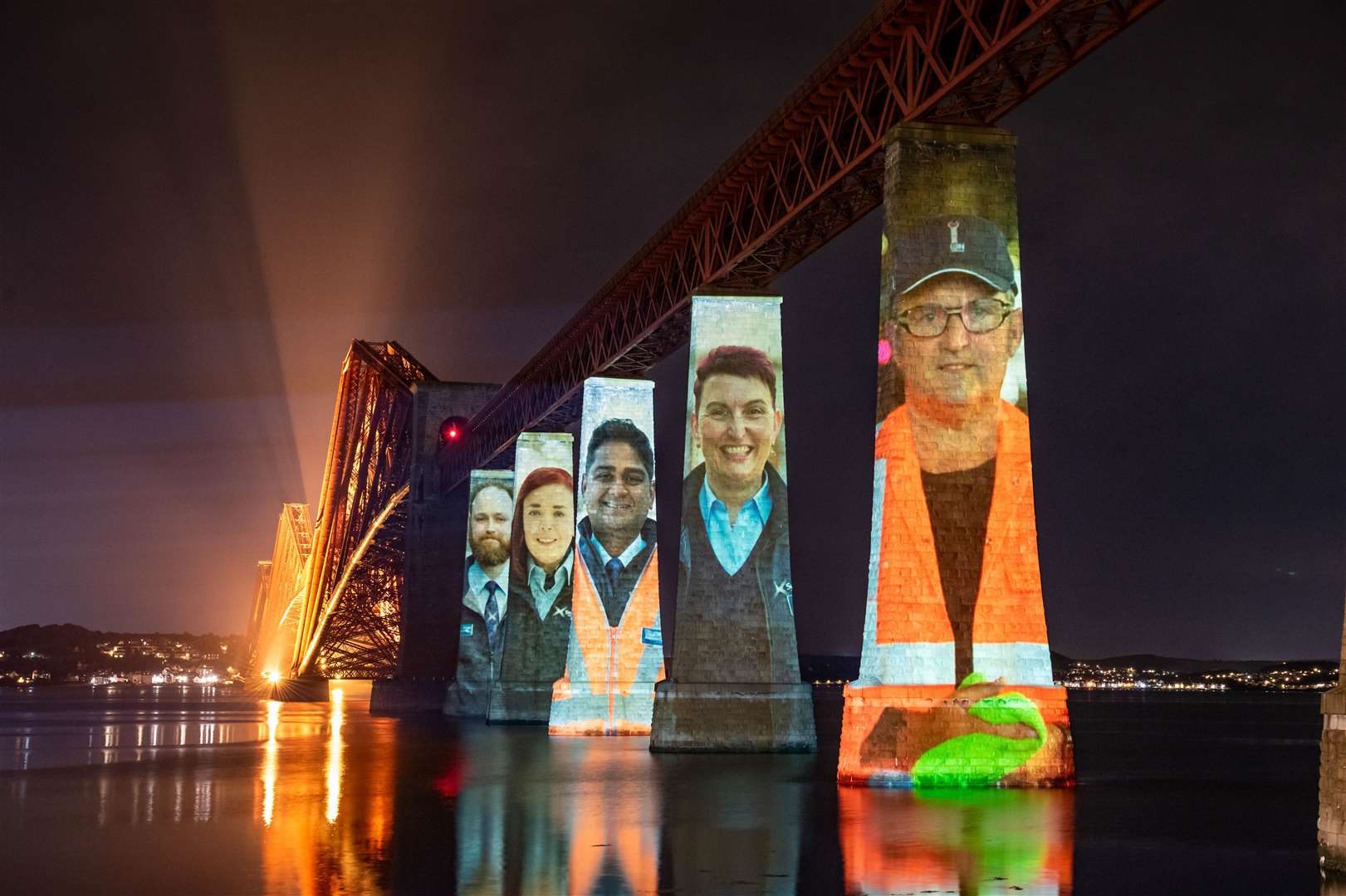 Projection of ScotRail staff on the Forth Bridge.