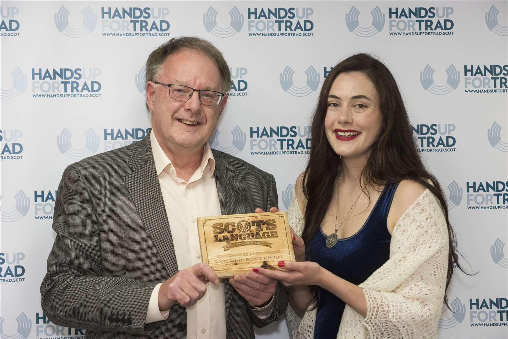 Gordon Hay was presented with his award by Shetland writer and comedian Marjolein Robertson