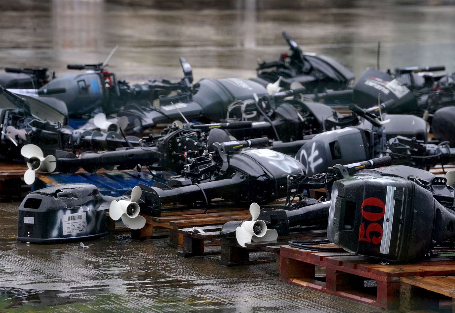 A view of small boats and engines used to cross the Channel (Gareth Fuller/PA)