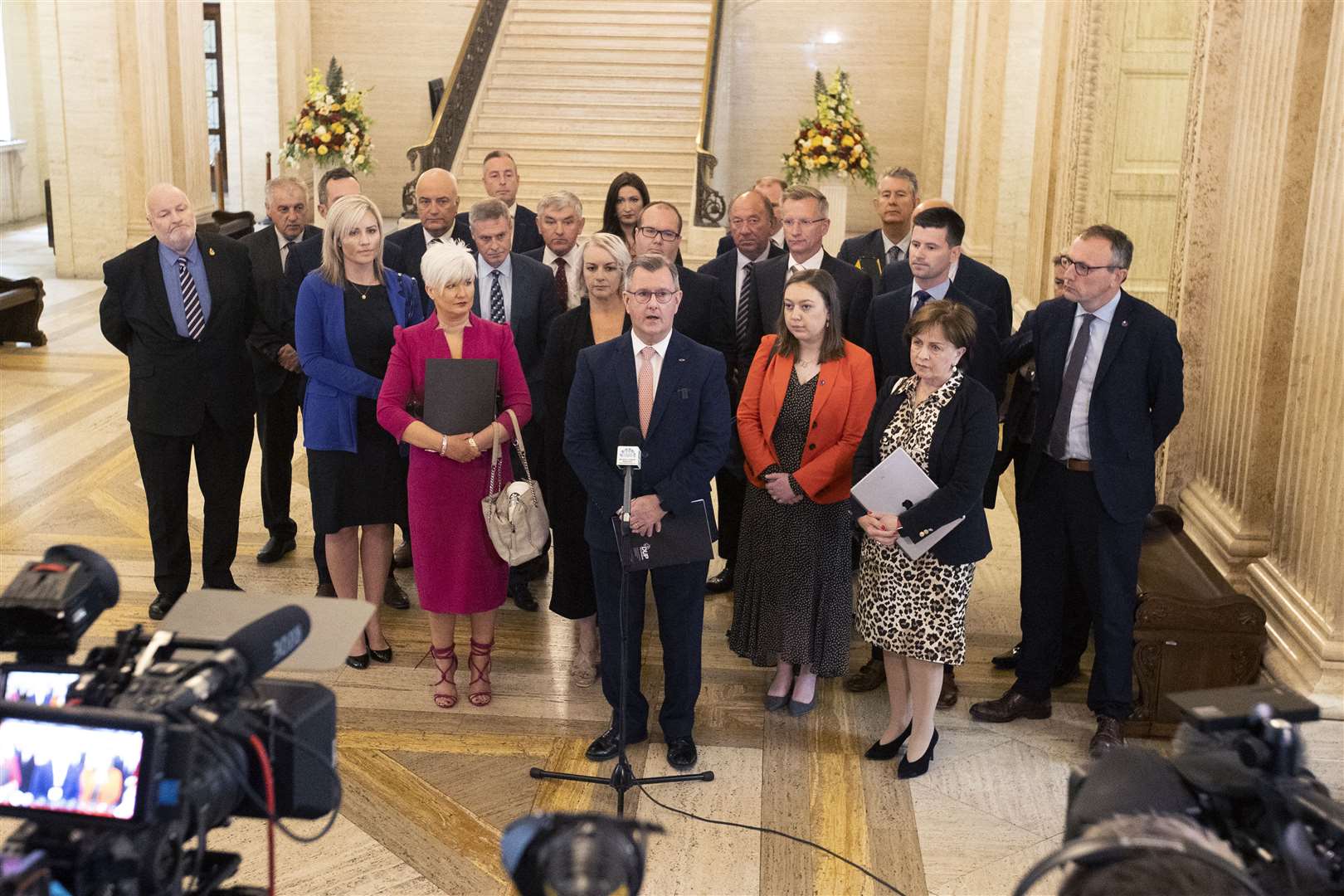 DUP Leader Sir Jeffrey Donaldson with party colleagues speaking in the Great Hall of Parliament Buildings at Stormont on Friday (Liam McBurney/PA)