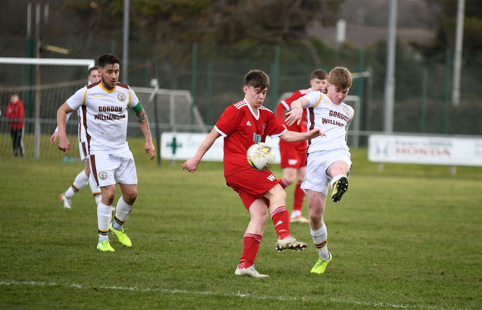 Deveronvale's Mikey Watson and Forres' Joe Gauld battle for the ball. Picture: Becky Saunderson..