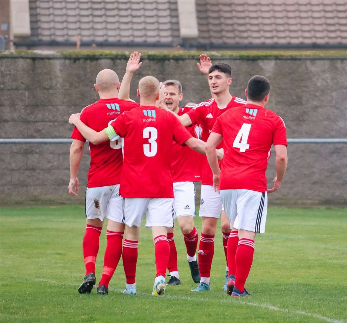 Deveronvale players celebrate one of their goals in the 3-3 draw against Clachnacuddin. Picture: Finlay Thom