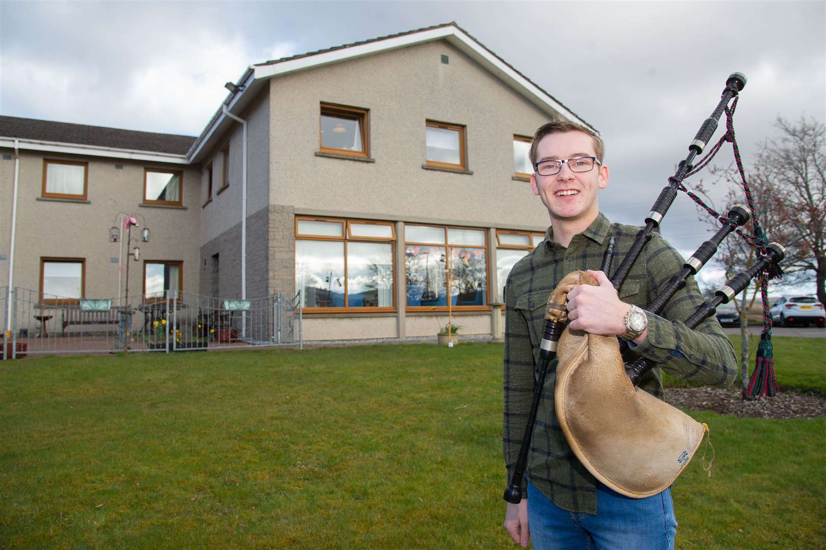 Keith Piper Ewen Brindle has been piping outside the Glenisla Care Home in Keith for the residents during the coronavirus pandemic. ..Picture: Daniel Forsyth..