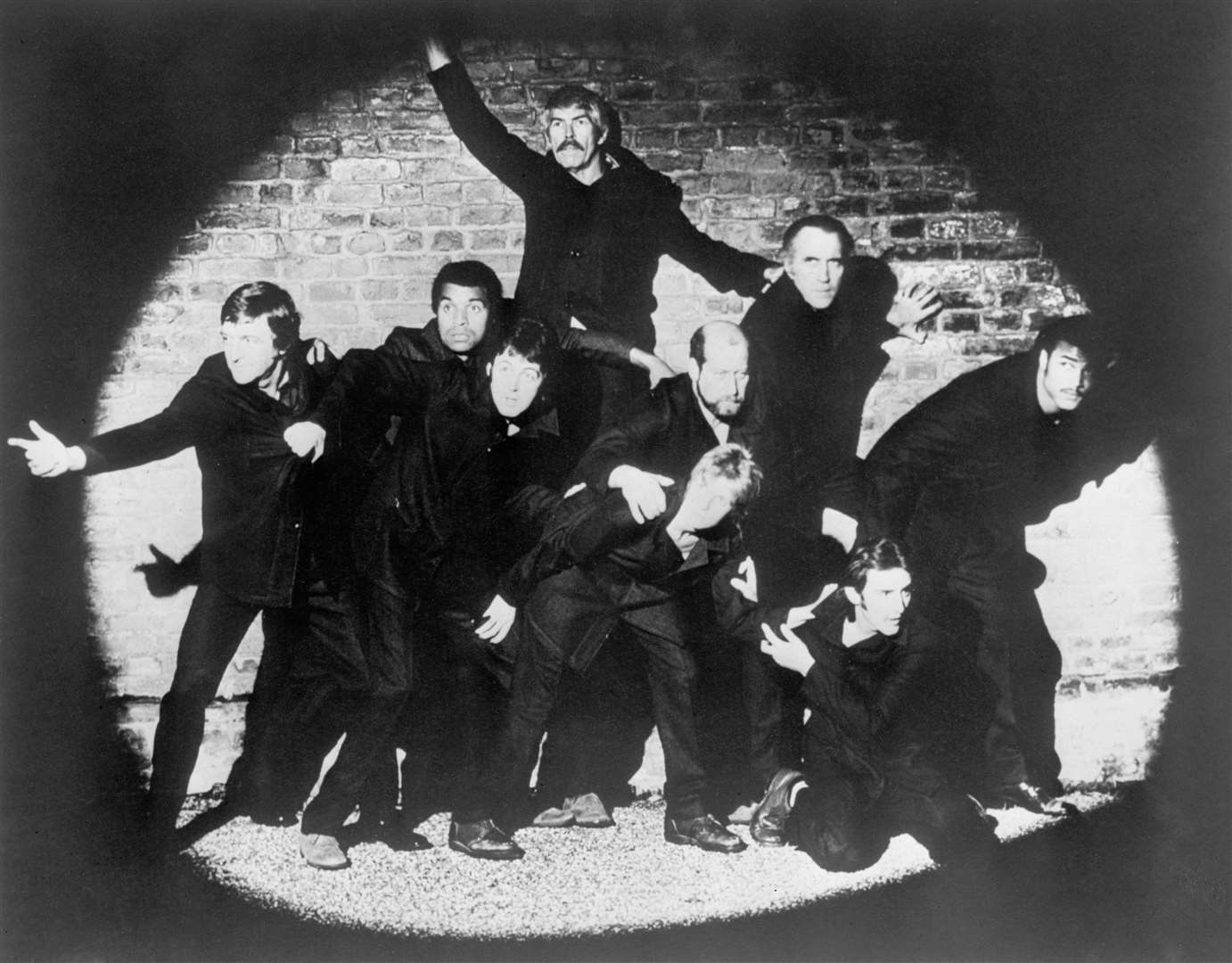 Sir Michael (furthest left) joined other celebrities on the cover of the Band On The Run album by Paul McCartney and Wings (PA)