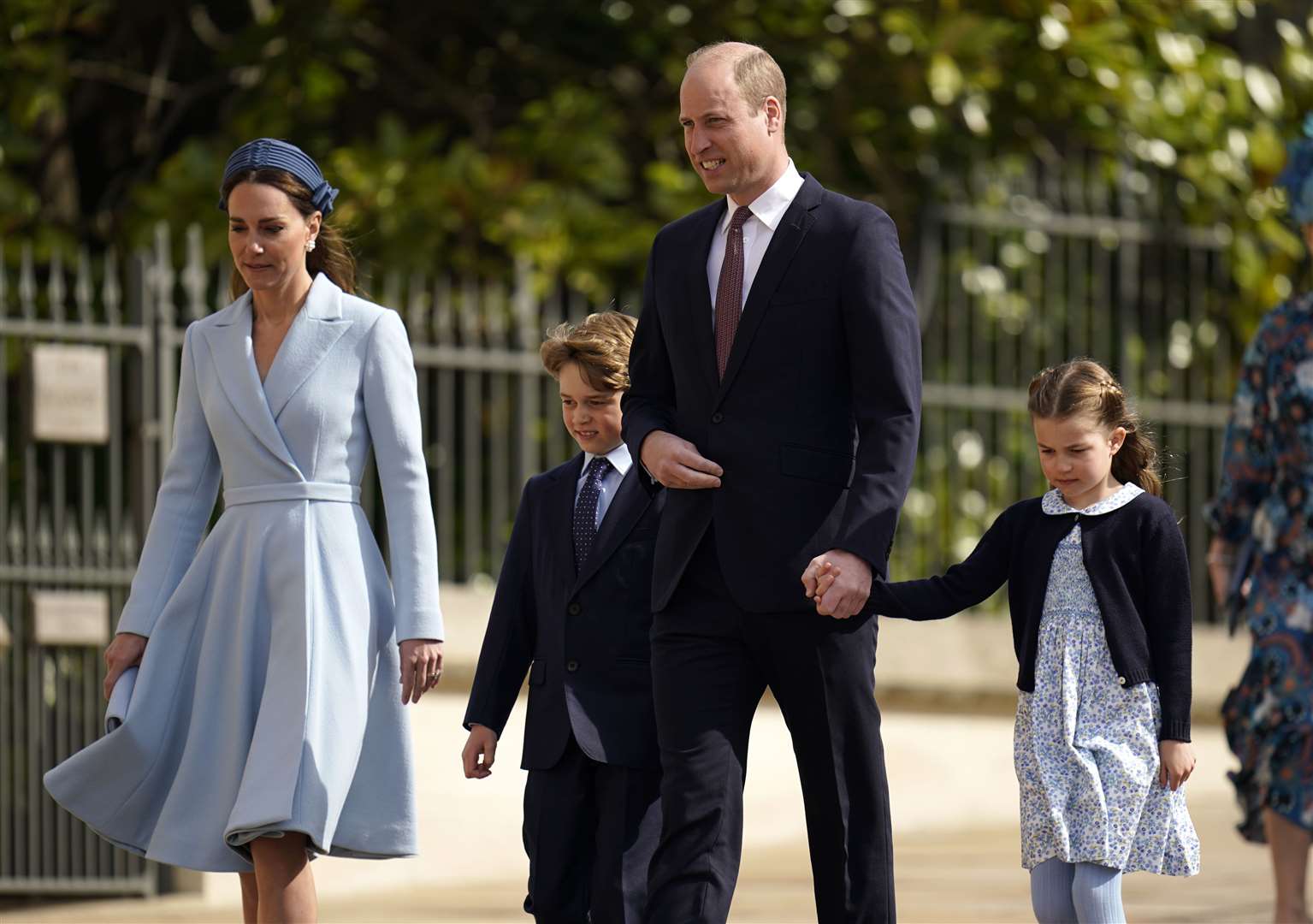 William and Kate with Prince George and Princess Charlotte at the Easter Mattins service in 2022 (Andrew Matthews/PA)