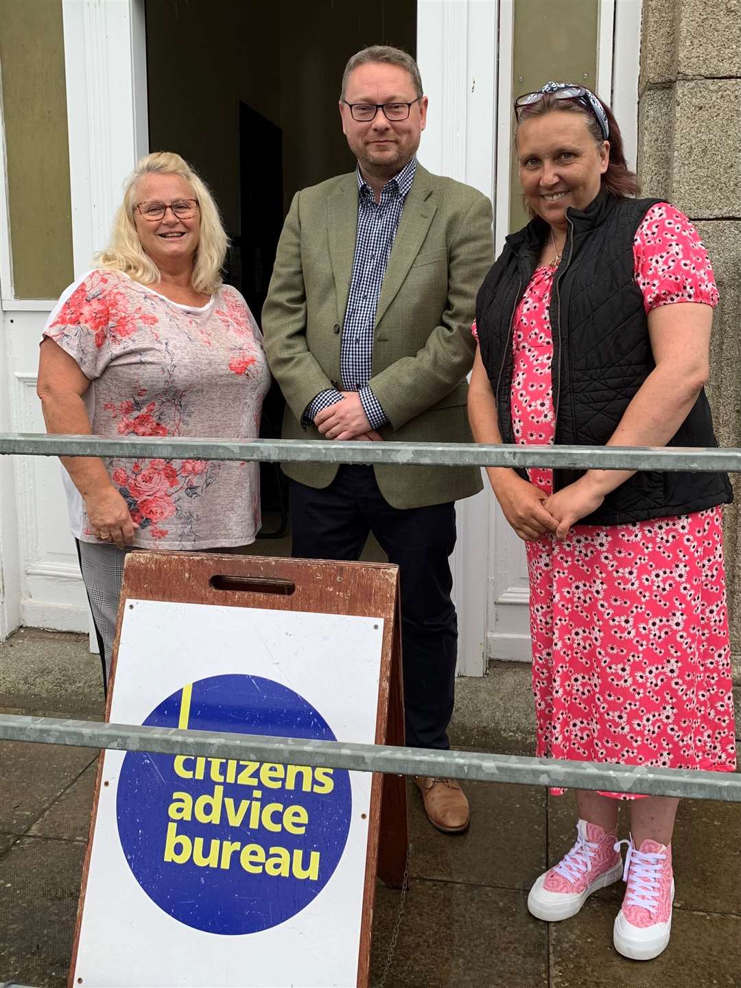 Shona Watson (left) and Tracy Copeland, with Richard Thomson MP at North-west Aberdeenshire Citizens’ Advice Bureau.