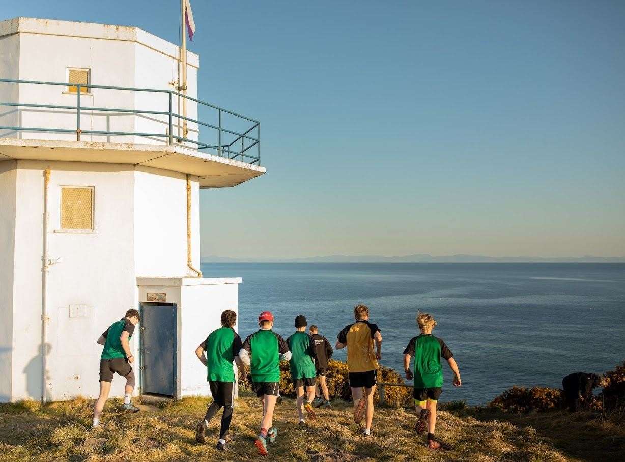 Gordonstoun School pupils pay tribute to Prince Philip in an early-morning run on Friday, April 16, from the school to the nearby Coastguard Watchtower.