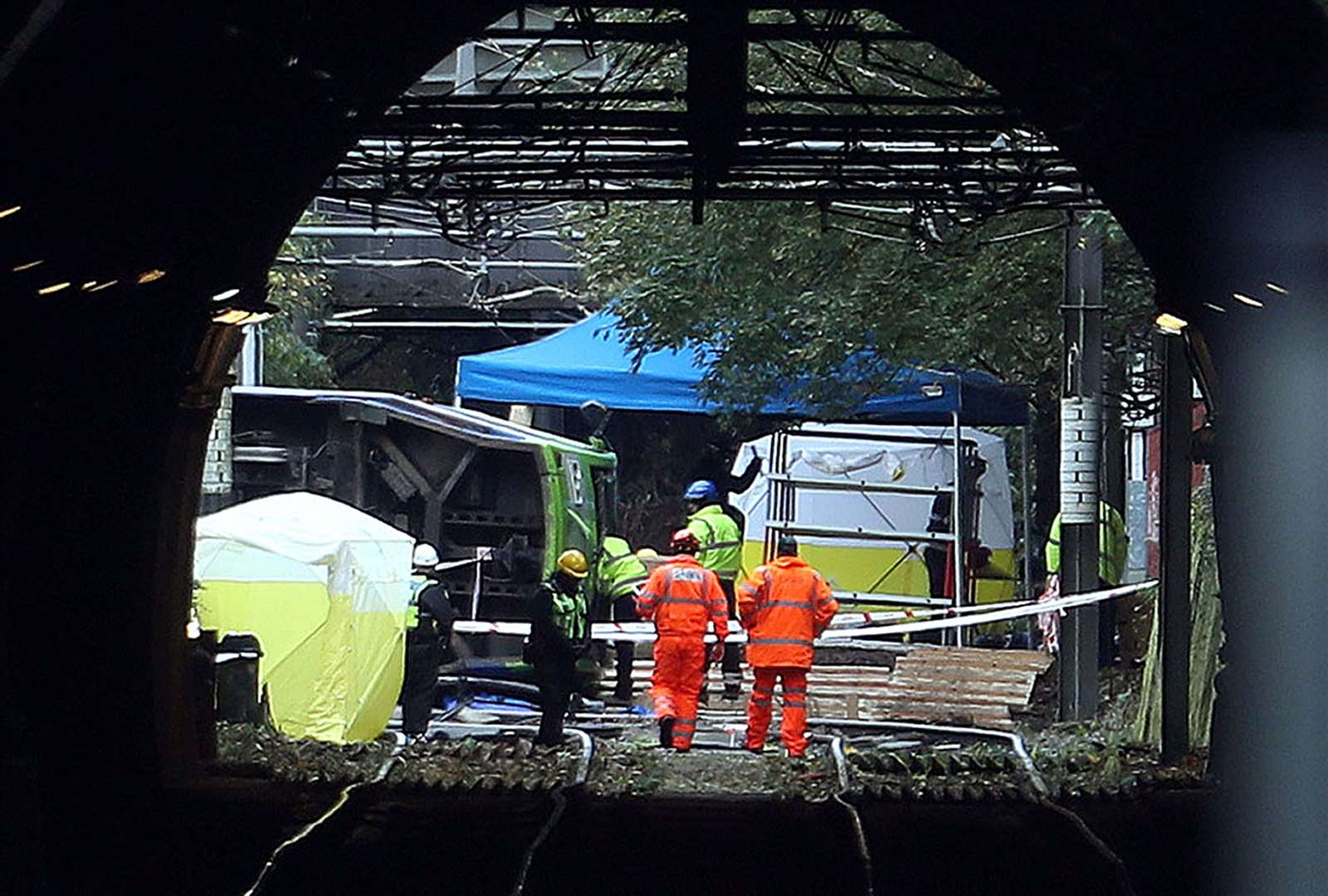 Investigators at the scene of the tram crash in Croydon, south London, in November 2016 (Steve Parsons/PA)