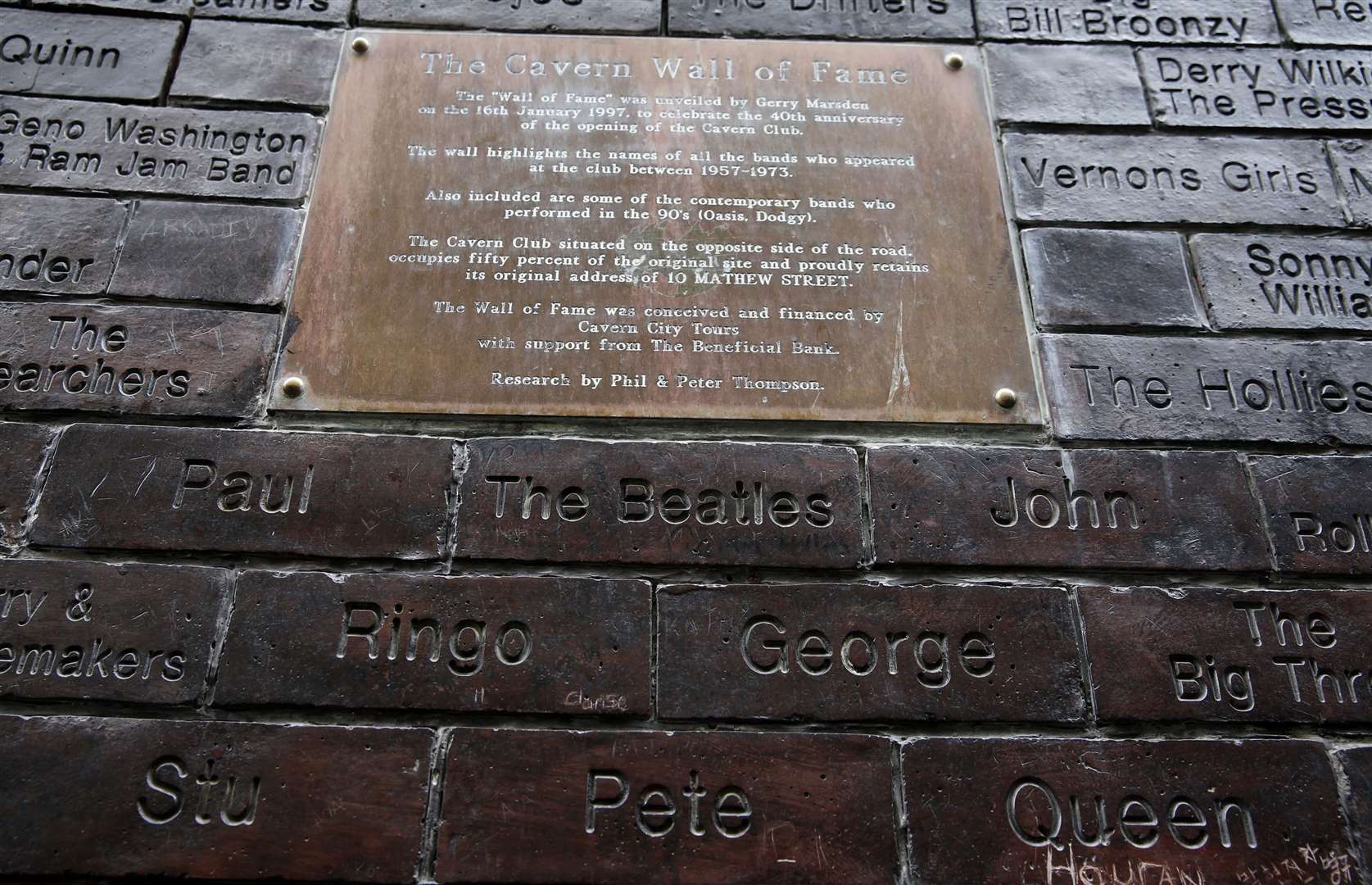 A wall of fame in Mathew Street in Liverpool featuring the names of members of The Beatles and other bands who performed at the Cavern Club (Peter Byrne/PA)