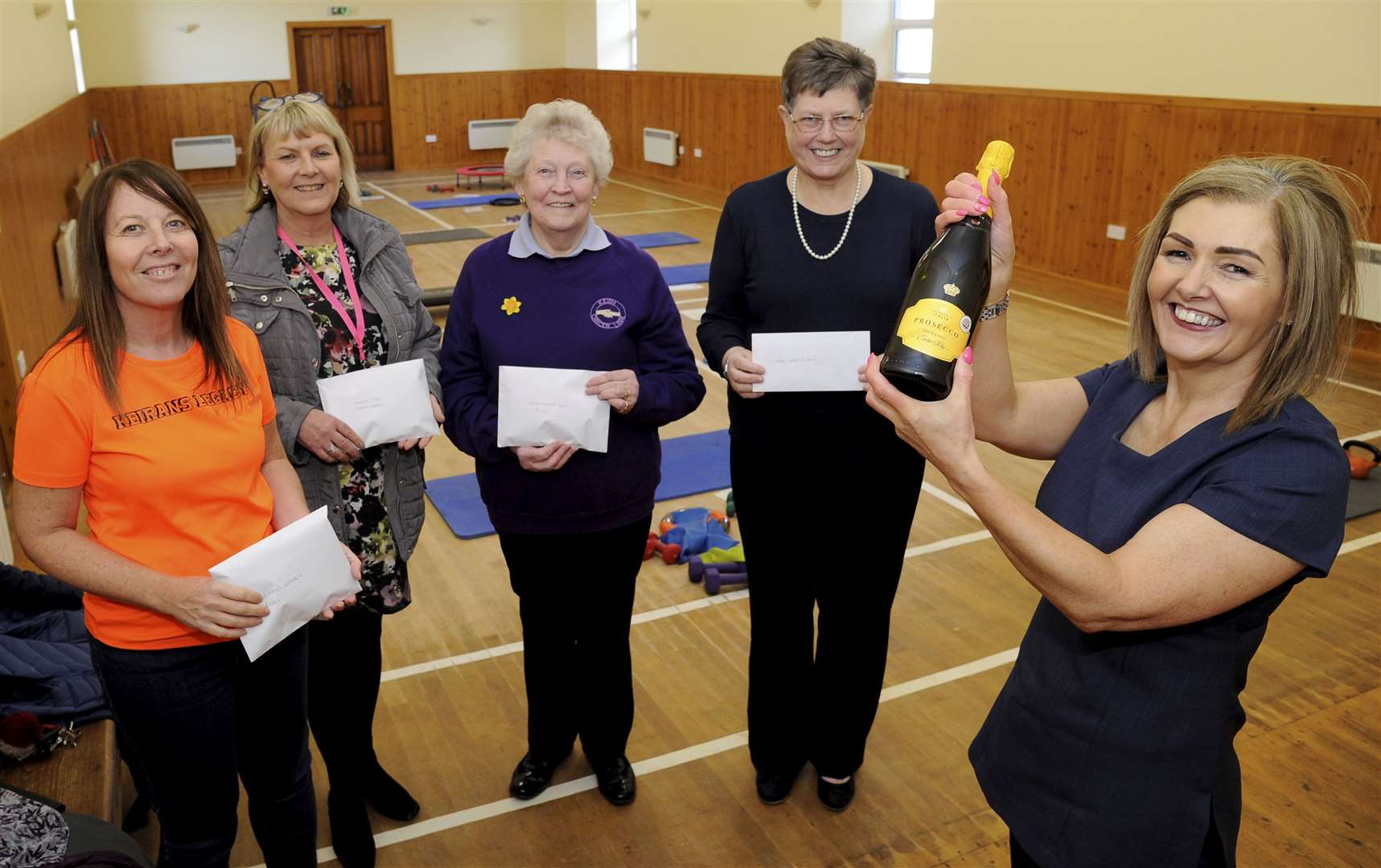 Heather Stephen (right) hosted a prosecco day at Mulben Public Hall and raised more than £5000 for four charities. LtR: Sandra McKandie (Keiran's Legacy), Tracy Grant (SAMH), Evelyn Brodie (Keith Cancer Research] and Cherie Baxter (Mulben Hall committee). Picture: Eric Cormack