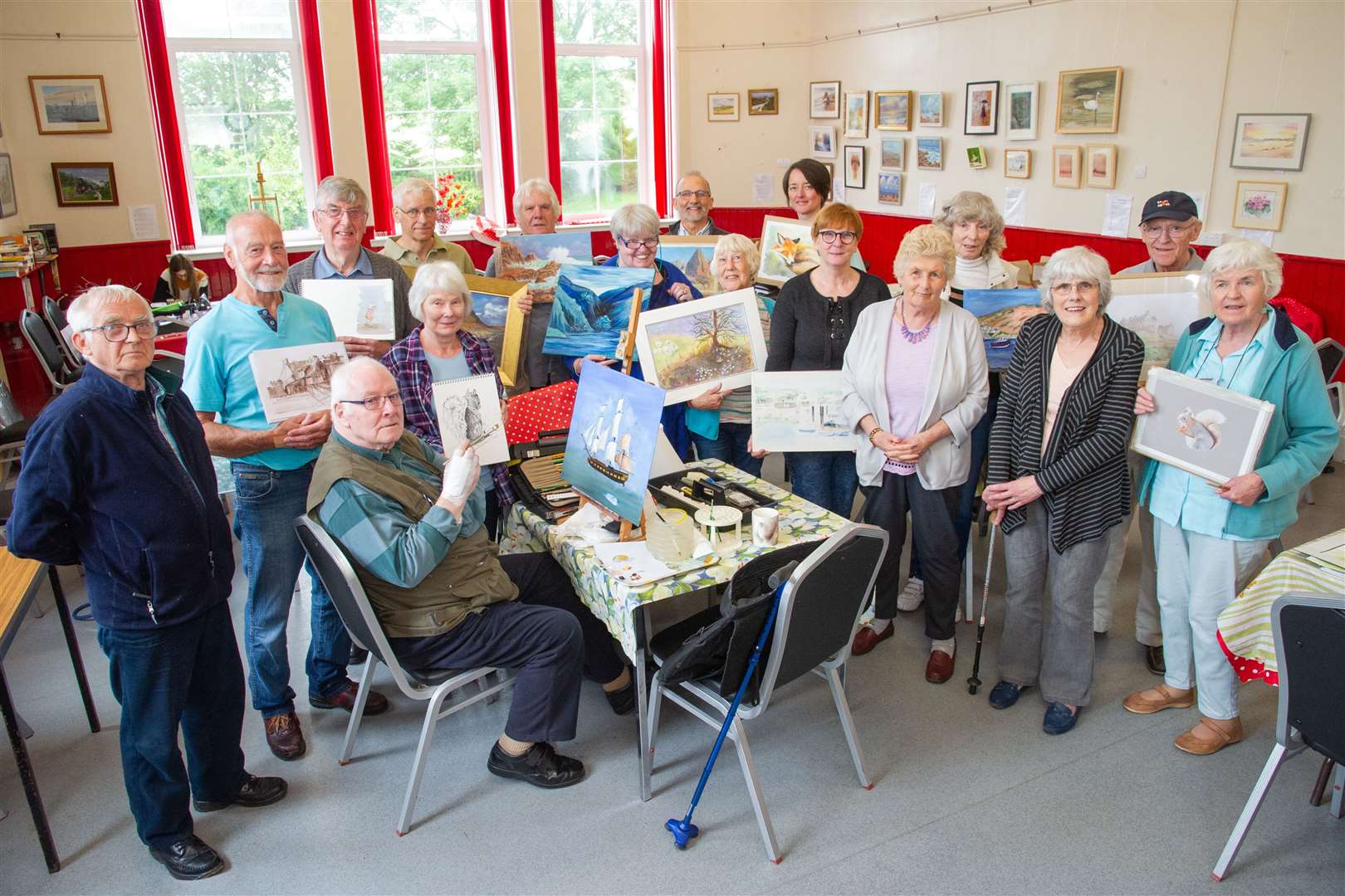 Portgordon Art Group put the finishing touches to their exhibition works. Picture: Daniel Forsyth. Image No.044437