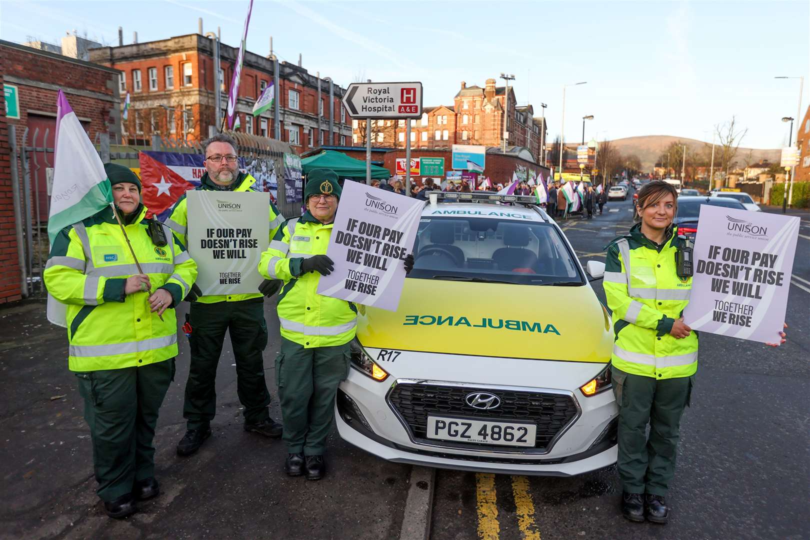 Ambulance workers on the picket line in Belfast (Liam McBurney/PA)
