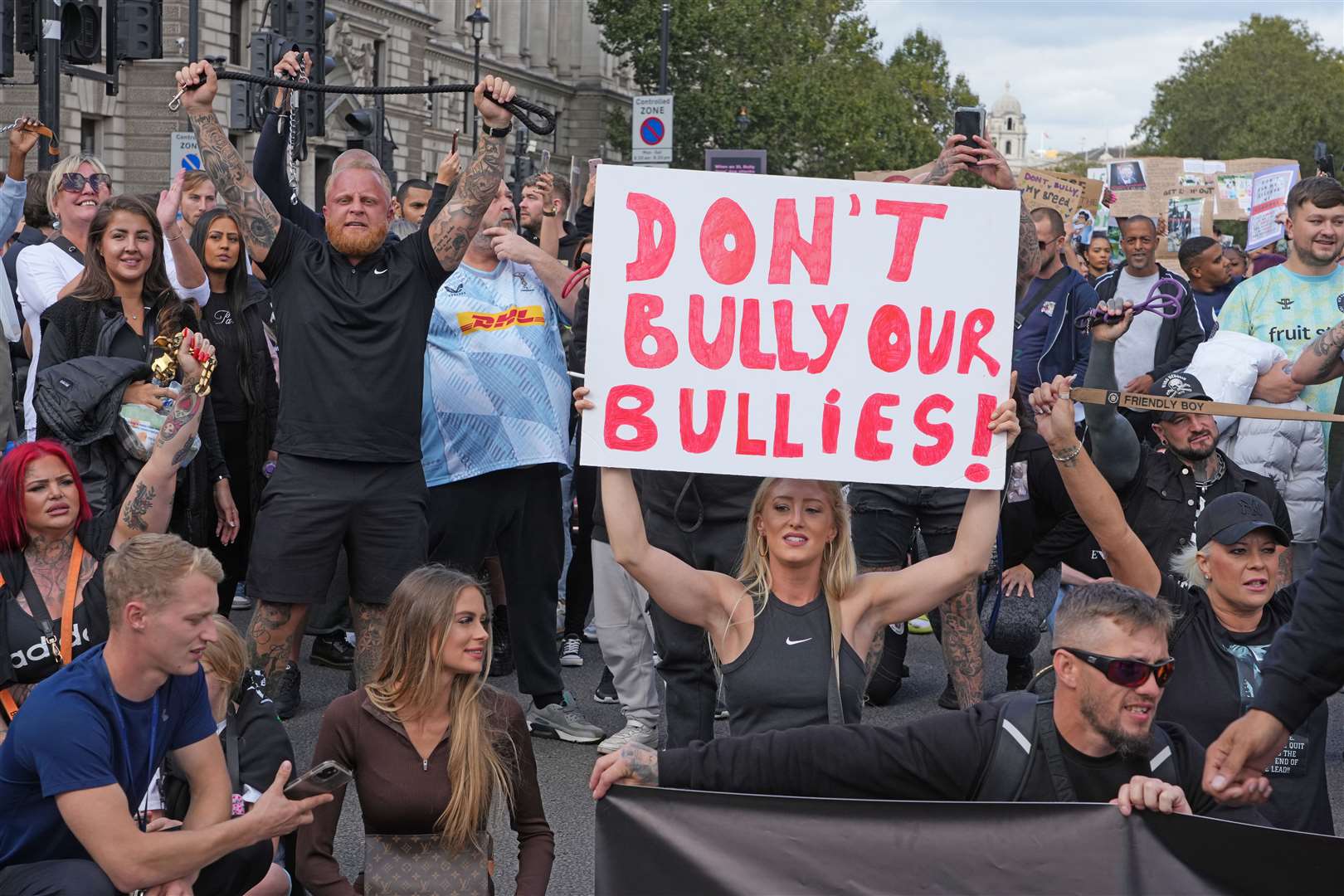 People take part in a protest in central London against the Government’s decision to add XL bully dogs to the list of prohibited breeds under the Dangerous Dogs Act (Jeff Moore/PA)