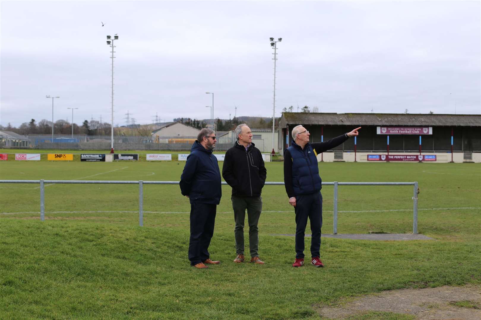 Koehler Renewable Energy UK Ltd representatives Alan Mathewson and Nick Forrest with Keith vice-chairman Charlie Simpson at Kynoch Park.
