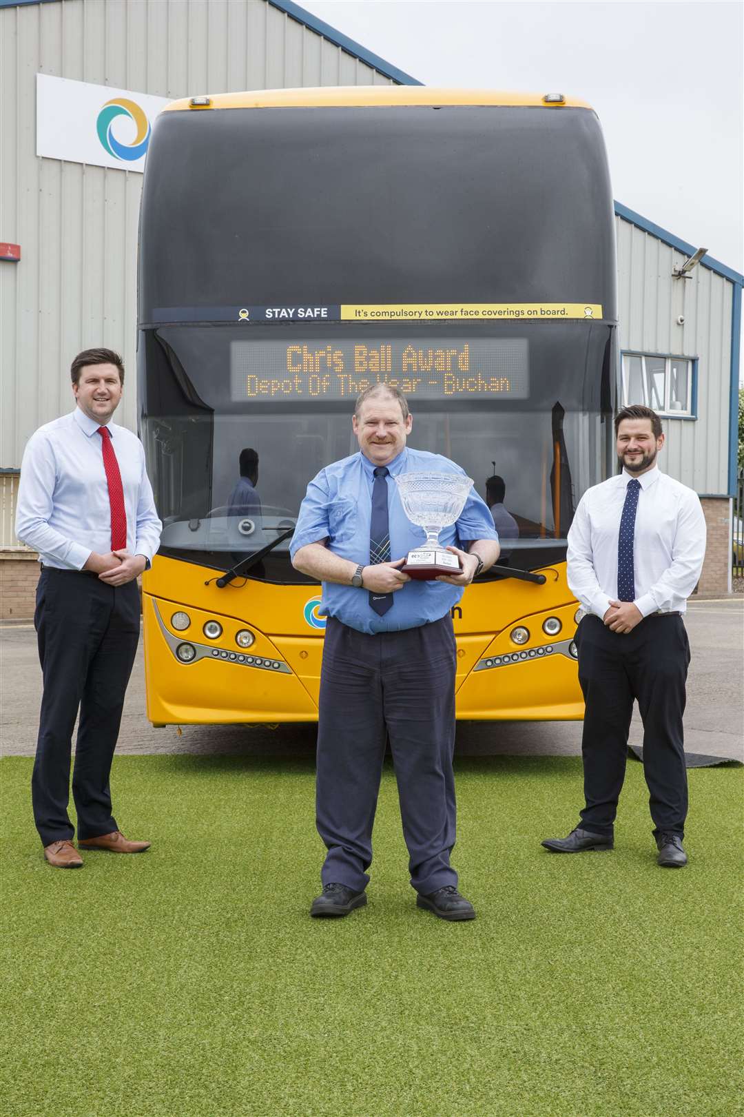 Peter Knight, John Thompson and Dan Bowden from Stagecoach Bluebird at the Buchan depot which won in the firm's eco-driving champions awards scheme.