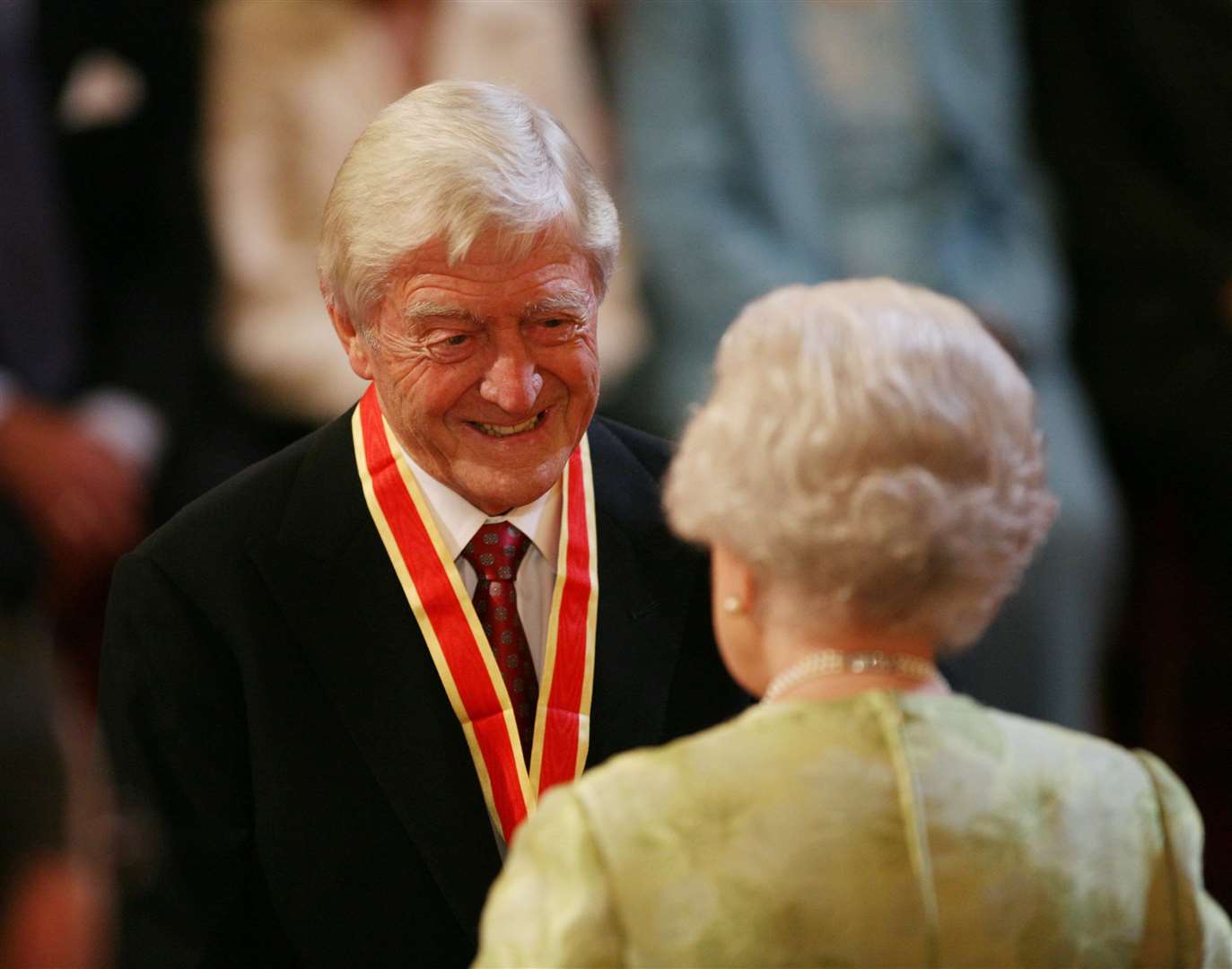 Sir Michael Parkinson receives his knighthood (Martin Keene/PA)