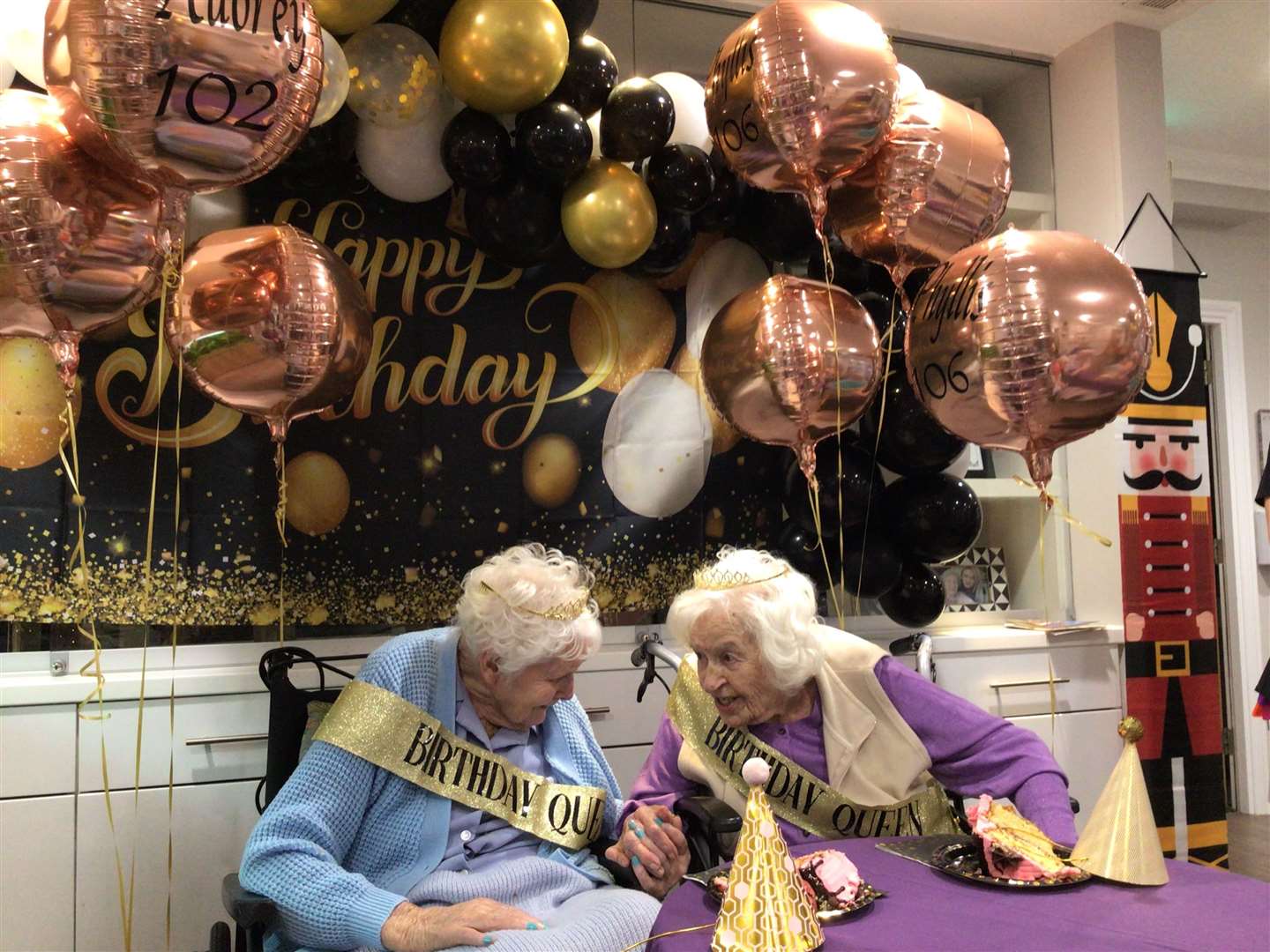 Care UK’s Amherst House threw the two centenarians a surprise birthday party with friends, balloons and cake (Care UK)