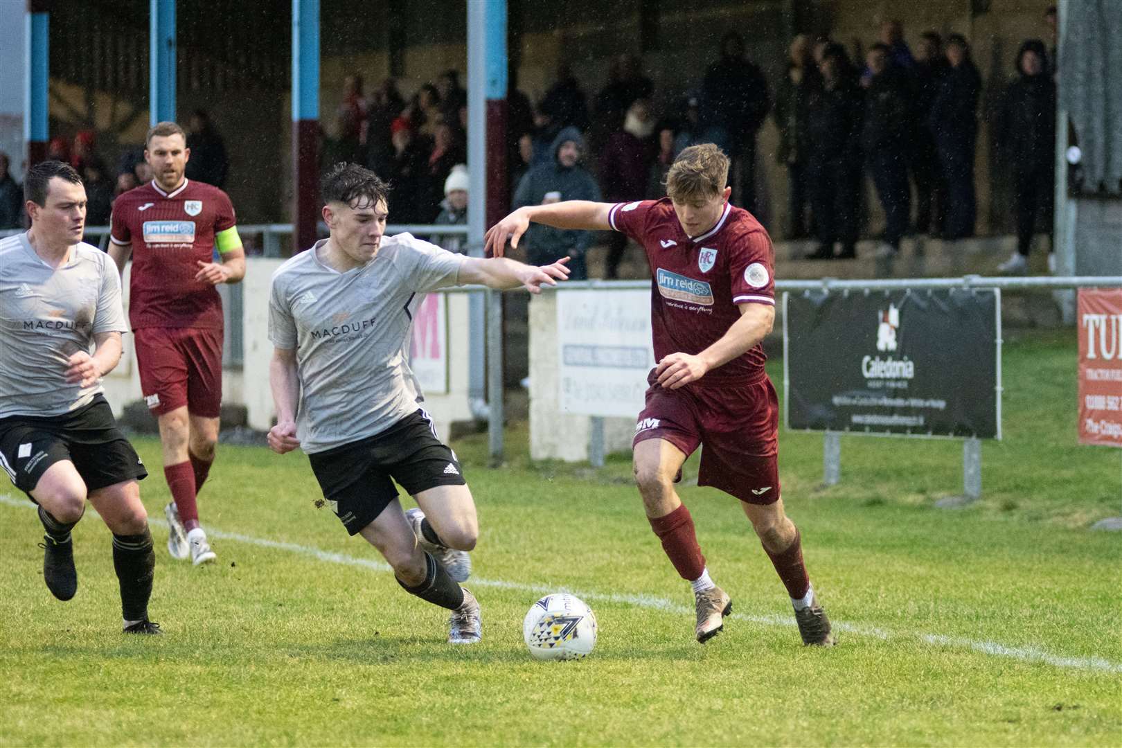 Keith Maroon Kieran Mooney pushes his way up the park...Keith FC (1) vs Deveronvale FC (1) - Highland Football League 22/23 - Kynoch Park, Keith 04/02/23...Picture: Daniel Forsyth..
