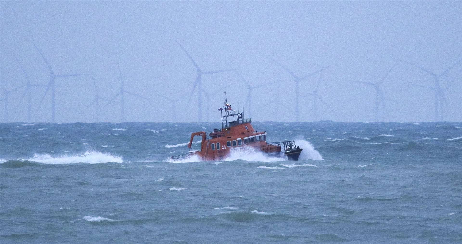 The RNLI severn class Lifeboat heads to Newhaven harbour (Steve Parsons/PA)