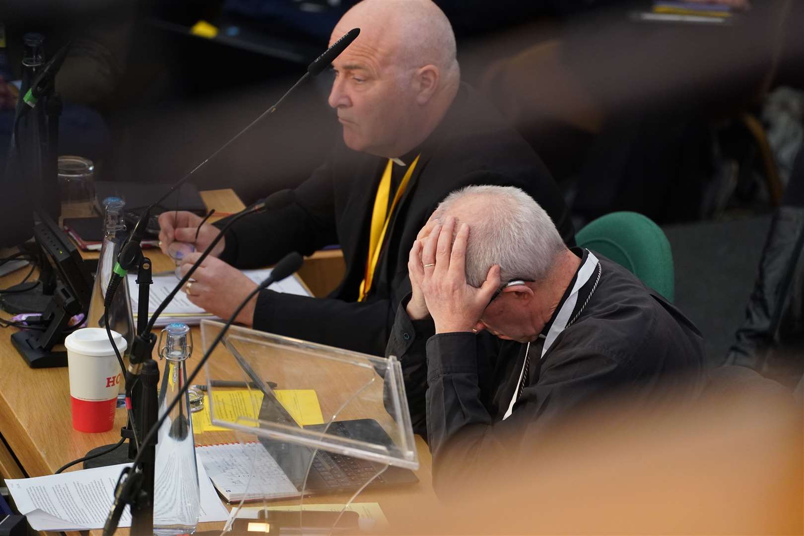 The Archbishop of Canterbury holds his head in his hands at the General Synod (James Manning/PA).