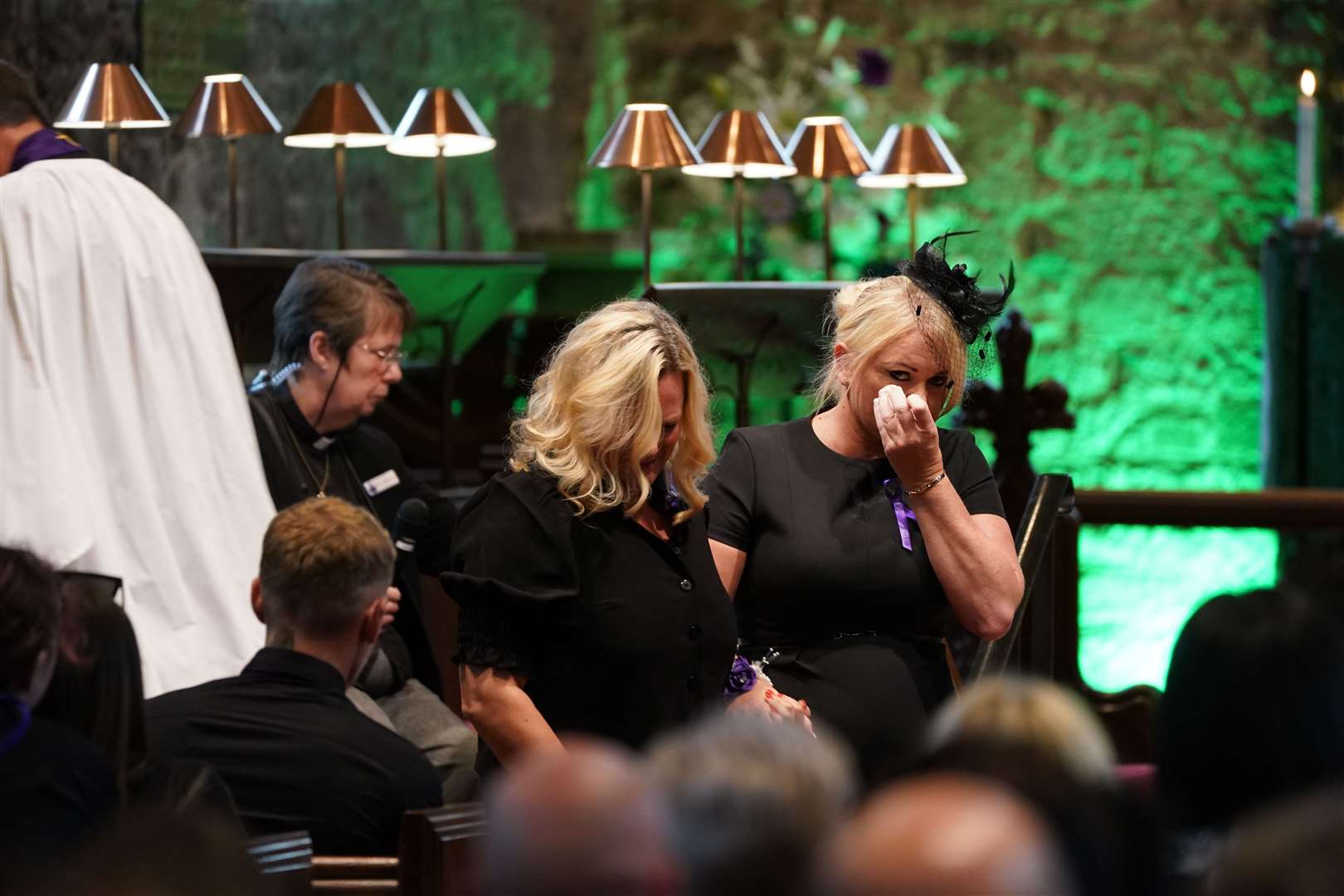 Hollie Dance (right), mother of Archie, at the funeral of her son (Joe Giddens/ PA)