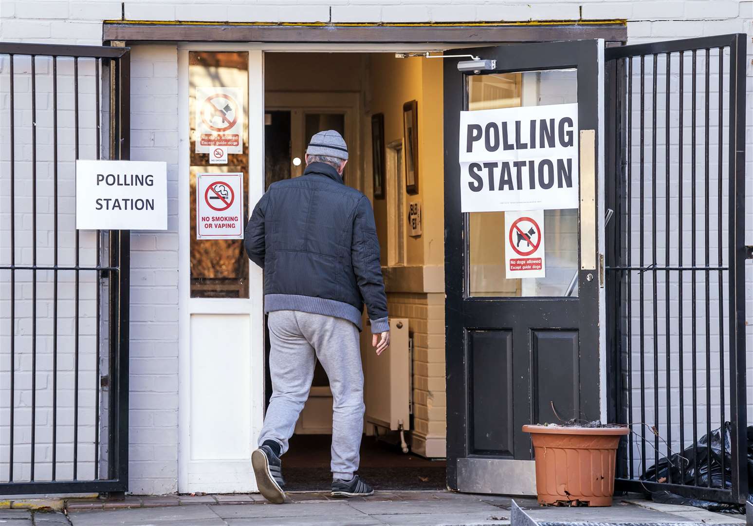 A man arrives at Sharon Youth Centre in Stretford to vote (Danny Lawson/PA)