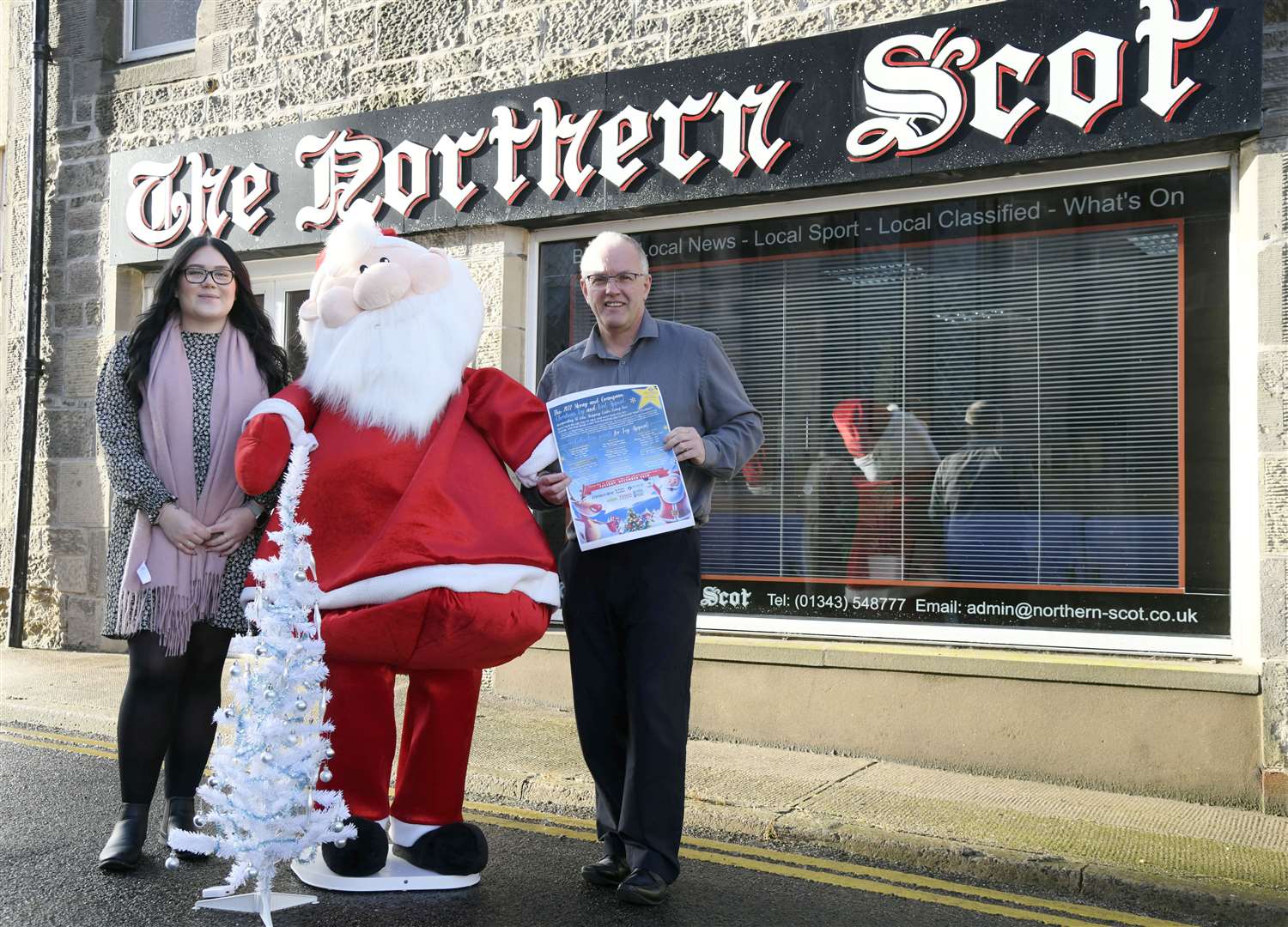Chloe O'Connor (left) and Chris Saunderson promoting the 2022 Moray and Grampian Christmas Toy and Food Appeal. Picture: Beth Taylor
