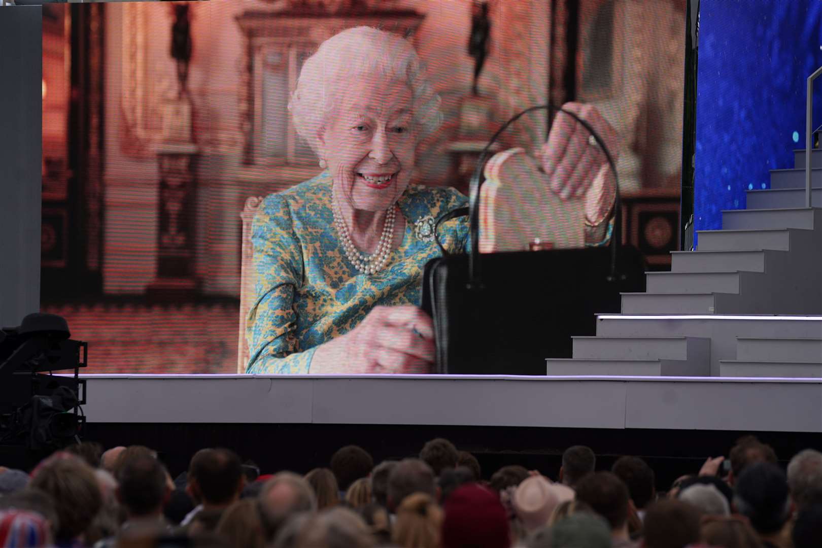 The Queen showing Paddington her marmalade sandwiches (Victoria Jones/PA)