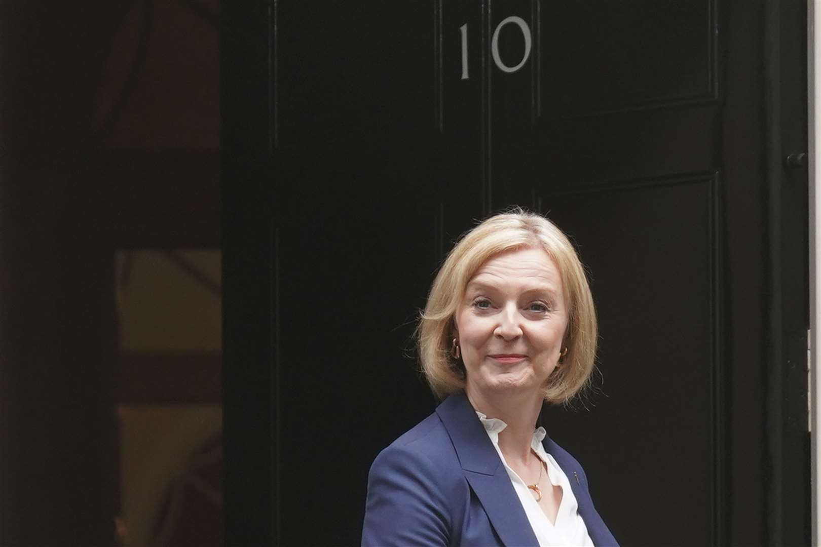 UK Prime Minister Liz Truss leaves 10 Downing Street, Westminster, London, to attend her first Prime Minister’s Questions (Stefan Rousseau/PA)