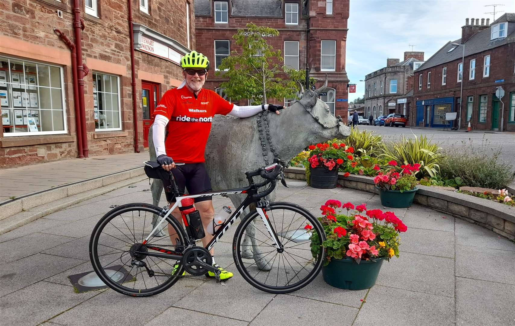Turriff cyclist Ian Hendry at the end of his challenge at the Turra Coo.